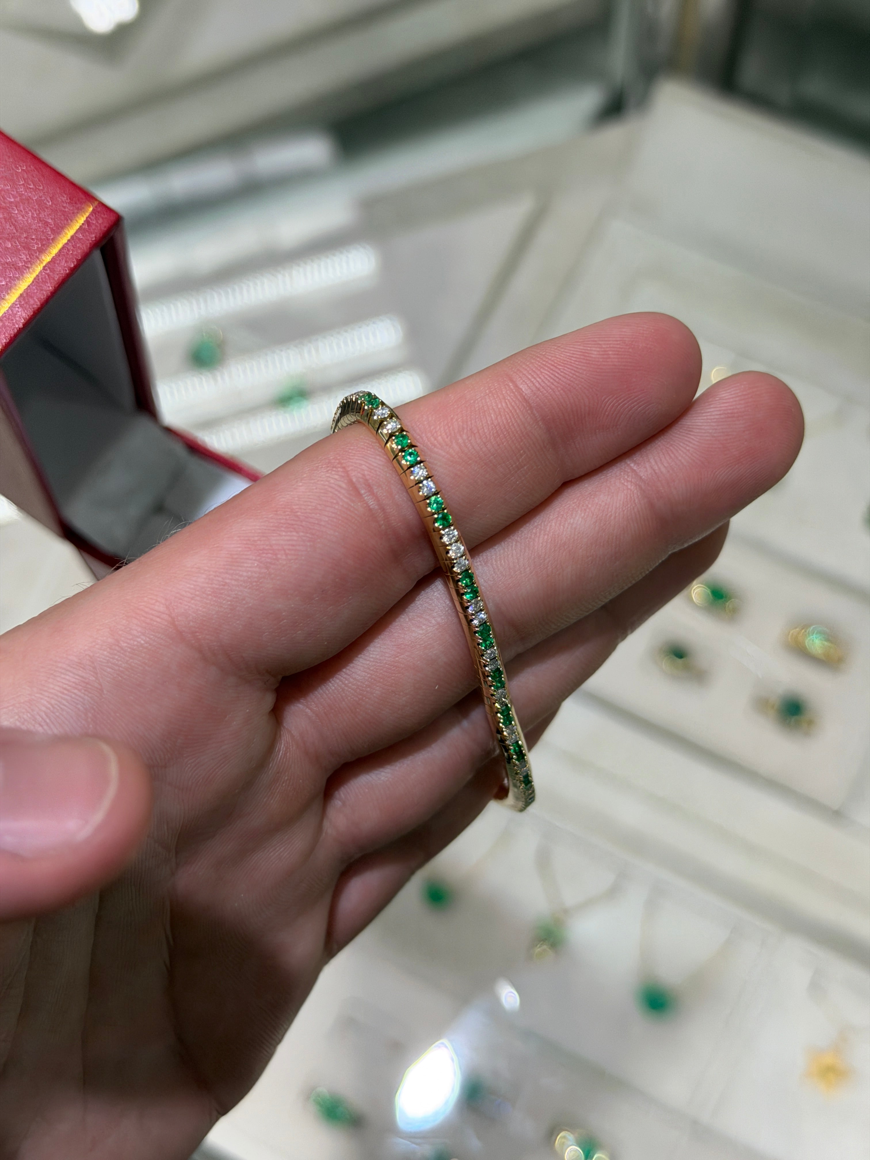 14K gold tennis bracelet with alternating natural emerald and diamond prong-set stones, stretchy design by JR Colombian Emeralds