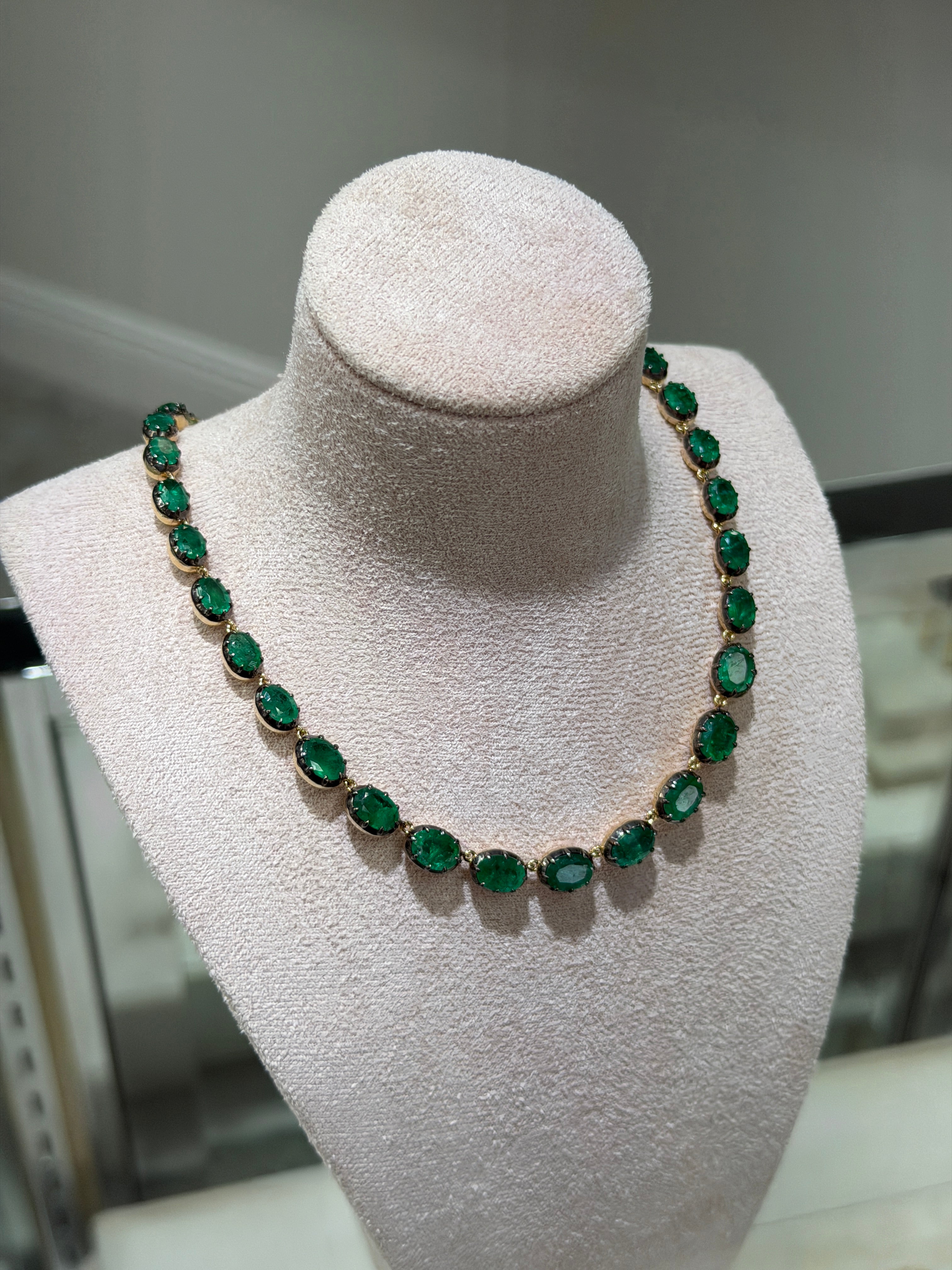 14K gold tennis necklace with oval-cut black rhodium button back pendants, 17-inch length, from JR Colombian Emeralds.