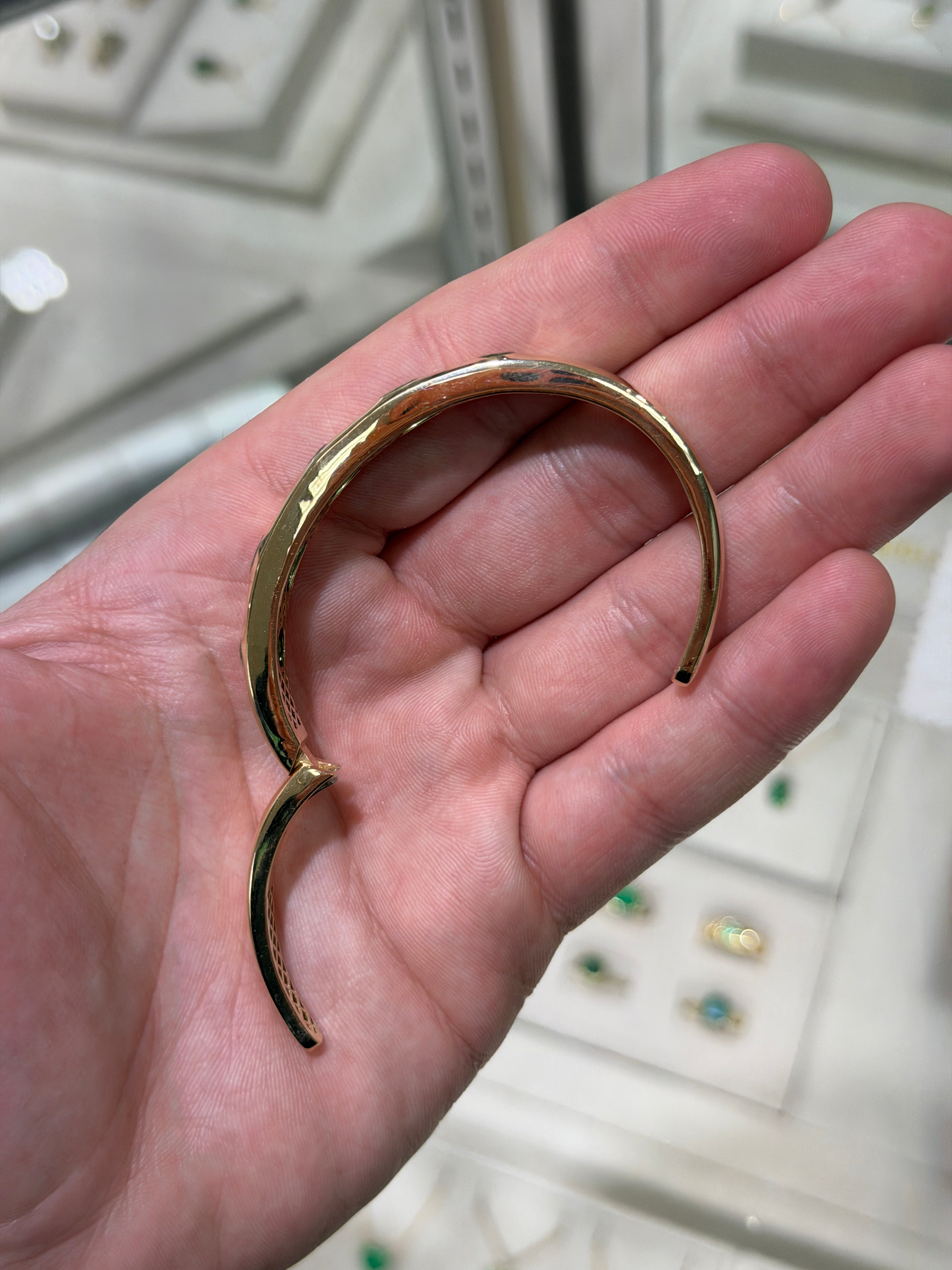 JR Colombian Emeralds bracelet featuring a 5.66tcw natural rich green pear and oval cut emeralds bezel set in 14K gold.