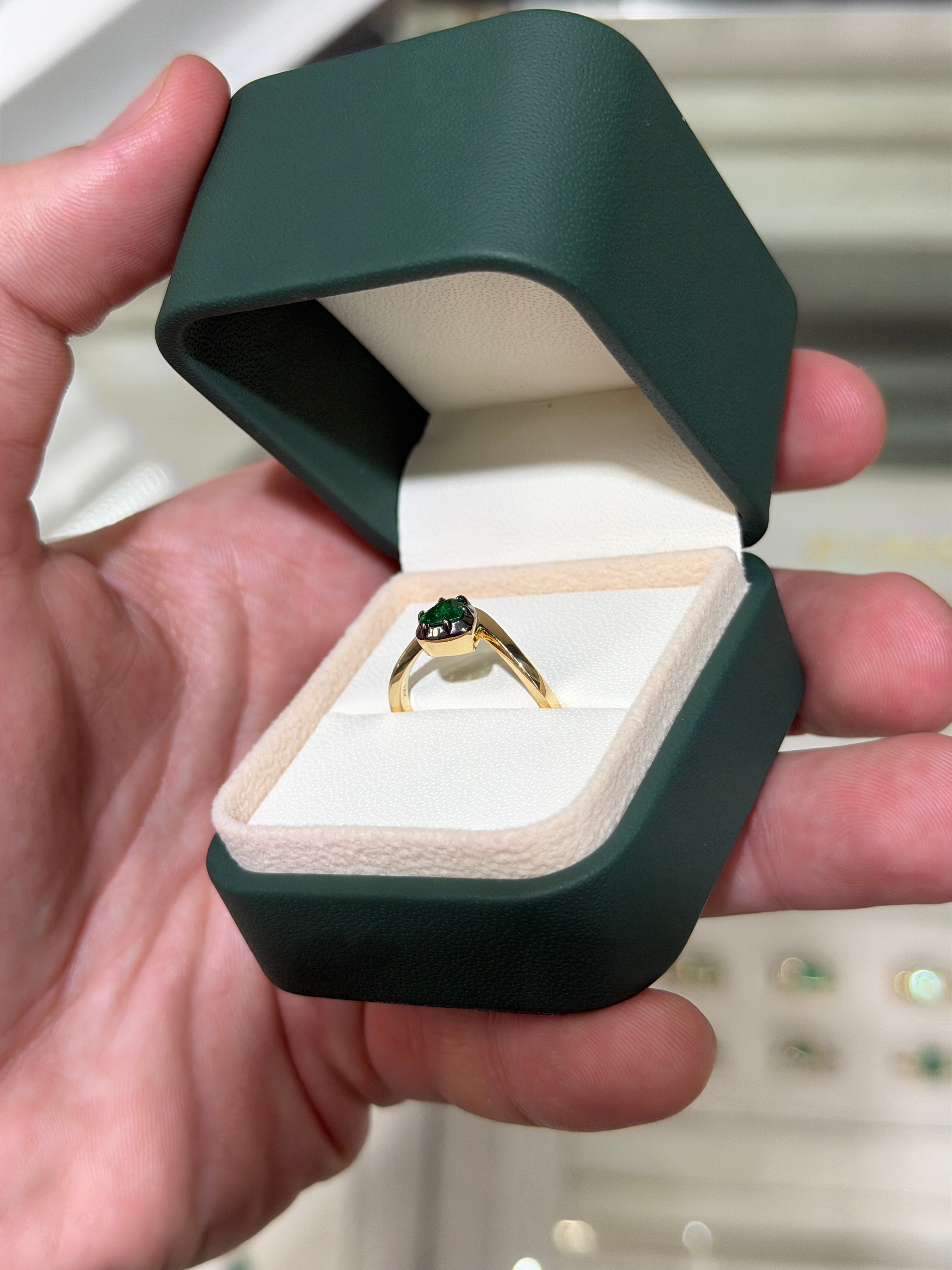 14K black rhodium-plated emerald solitaire ring with a 0.53ct heart-cut emerald and multi-prong setting by JR Colombian Emeralds