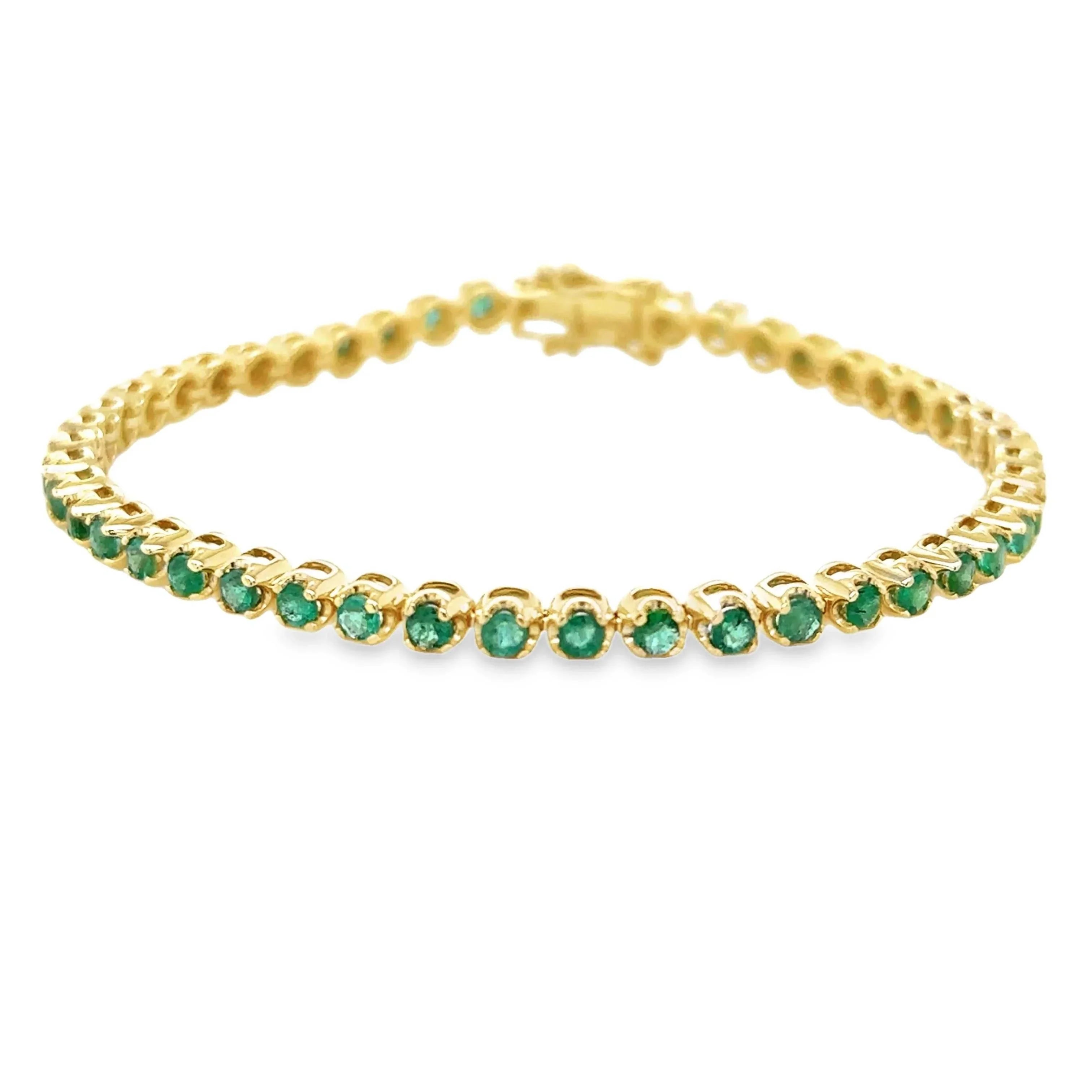 Medium green natural round emerald tennis bracelet in 14K gold, 7 inches
