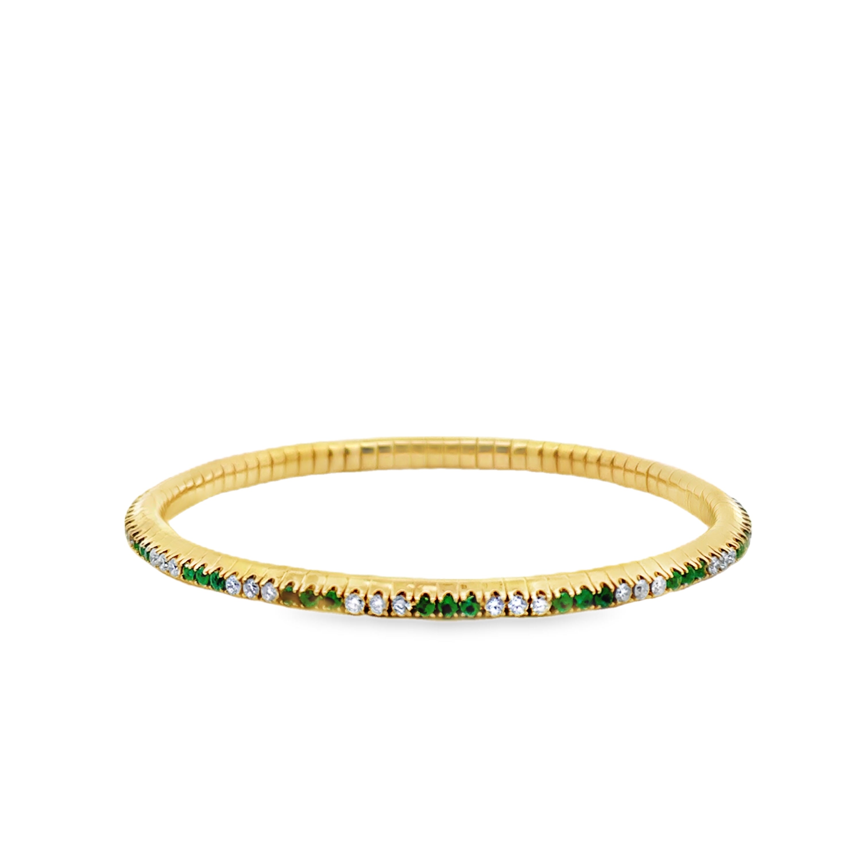 14K gold alternating emerald and diamond tennis bracelet with prong set stones, featuring a stretchy design from JR Colombian Emeralds.
