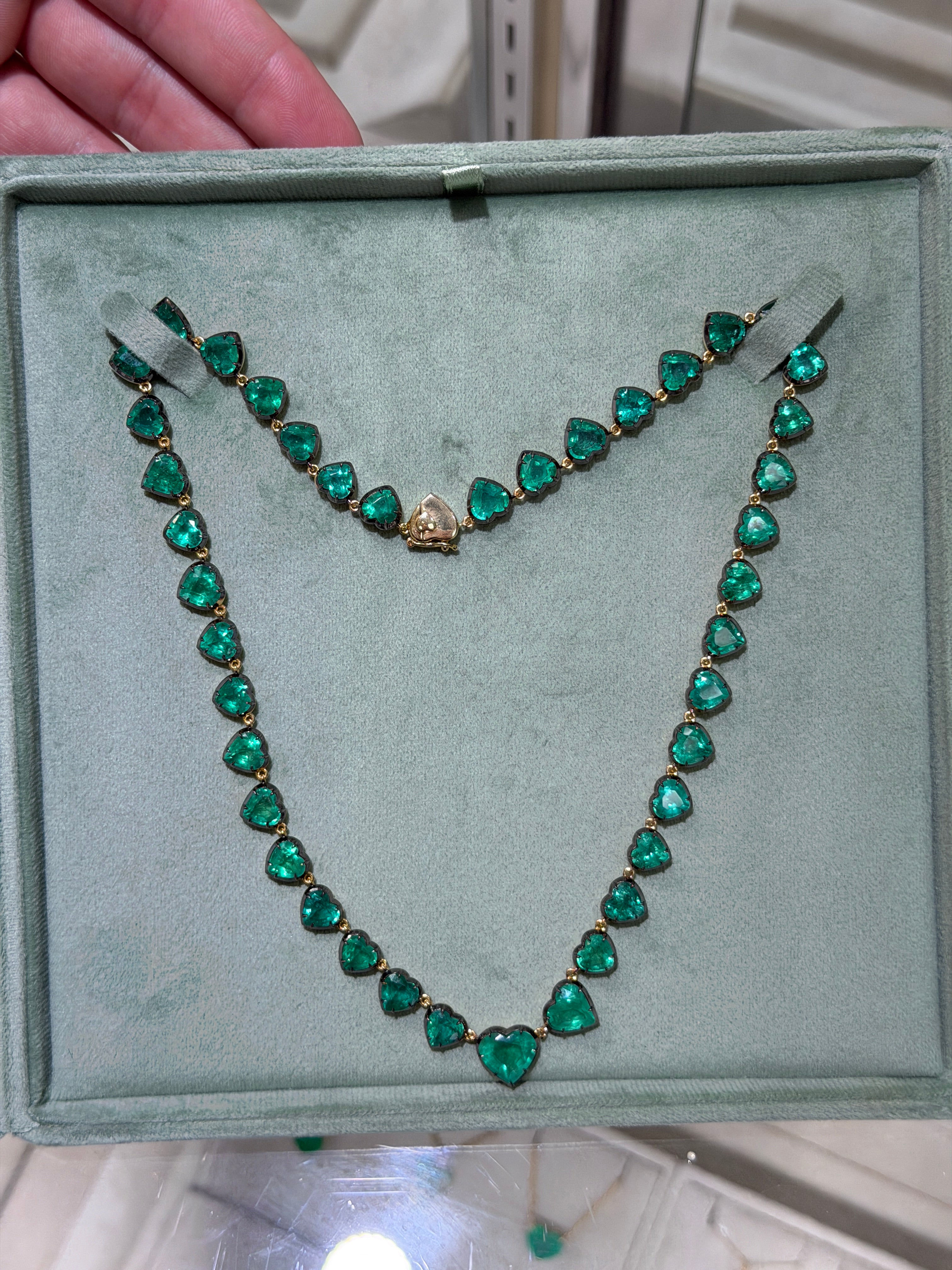 14K gold heart-shaped emerald tennis necklace with black rhodium, 60.98 carats, on an 18-inch chain by JR Colombian Emeralds
