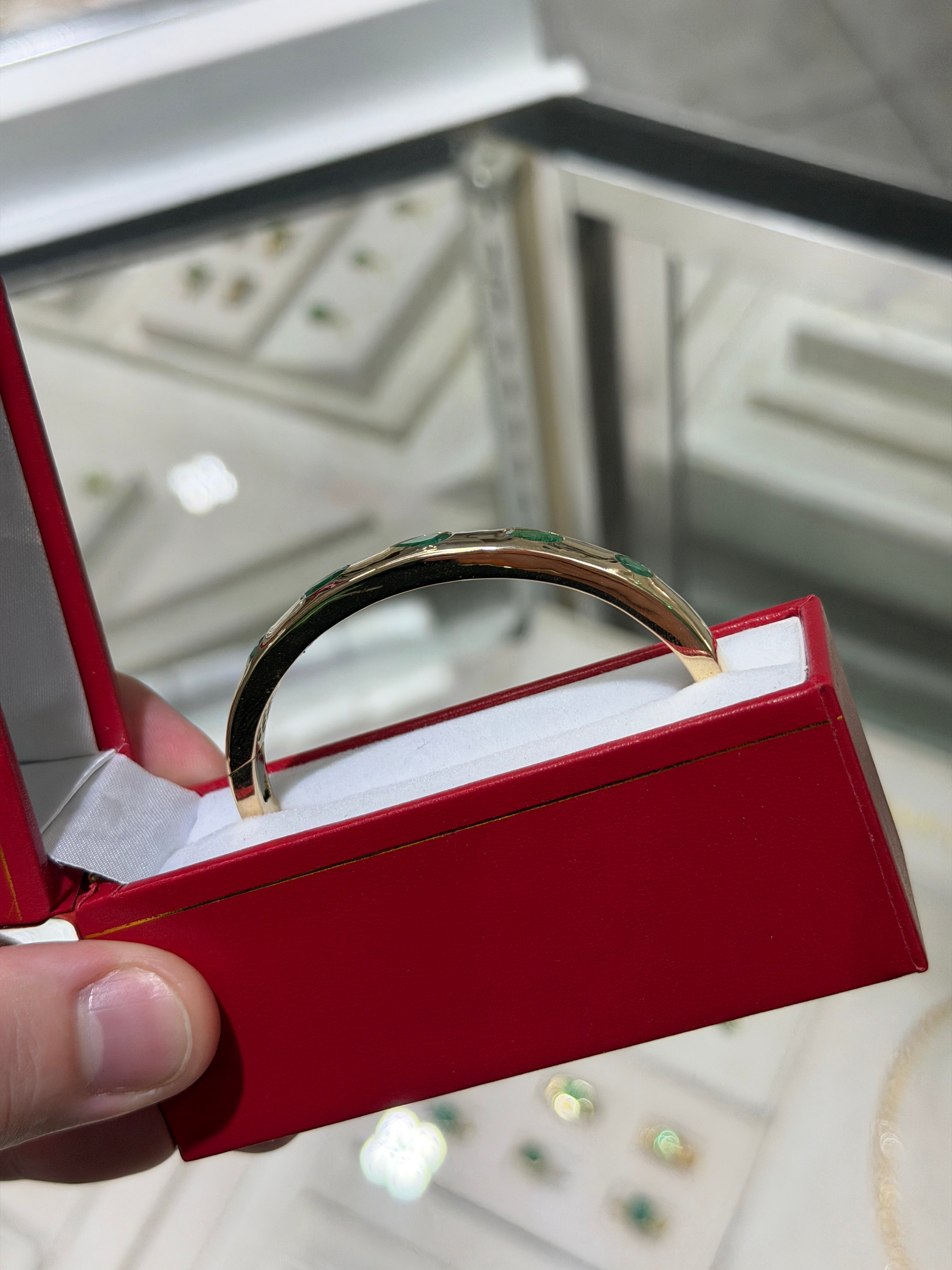 14K natural green emerald bangle bracelet with pear and oval cut gemstones, bezel set by JR Colombian Emeralds.