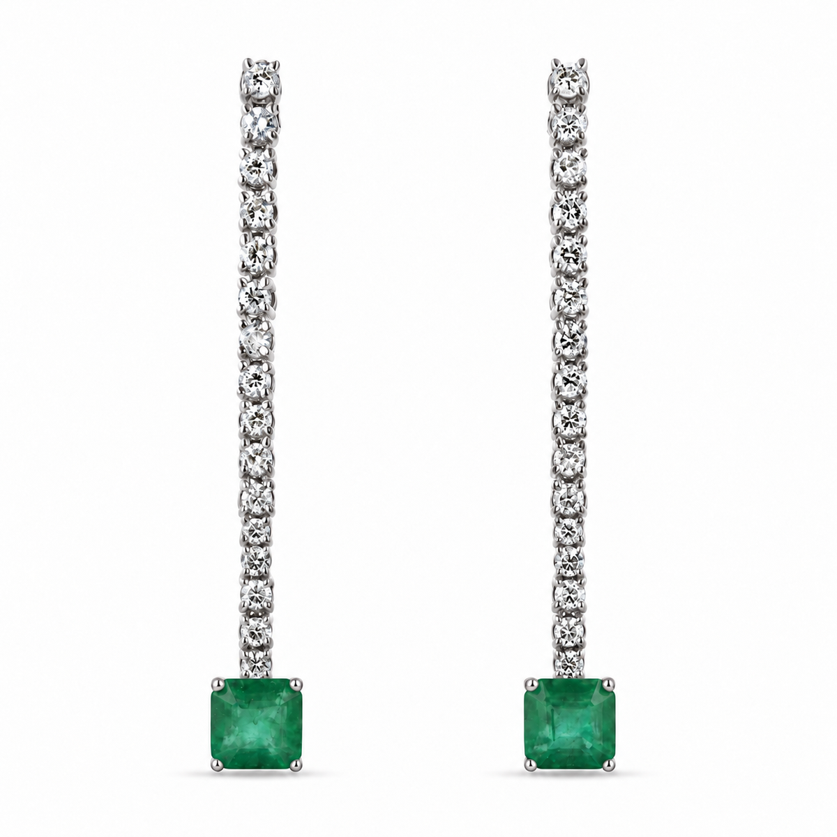 14K white gold emerald and diamond dangle earrings featuring dark green Asscher cut emeralds and sparkling diamonds.