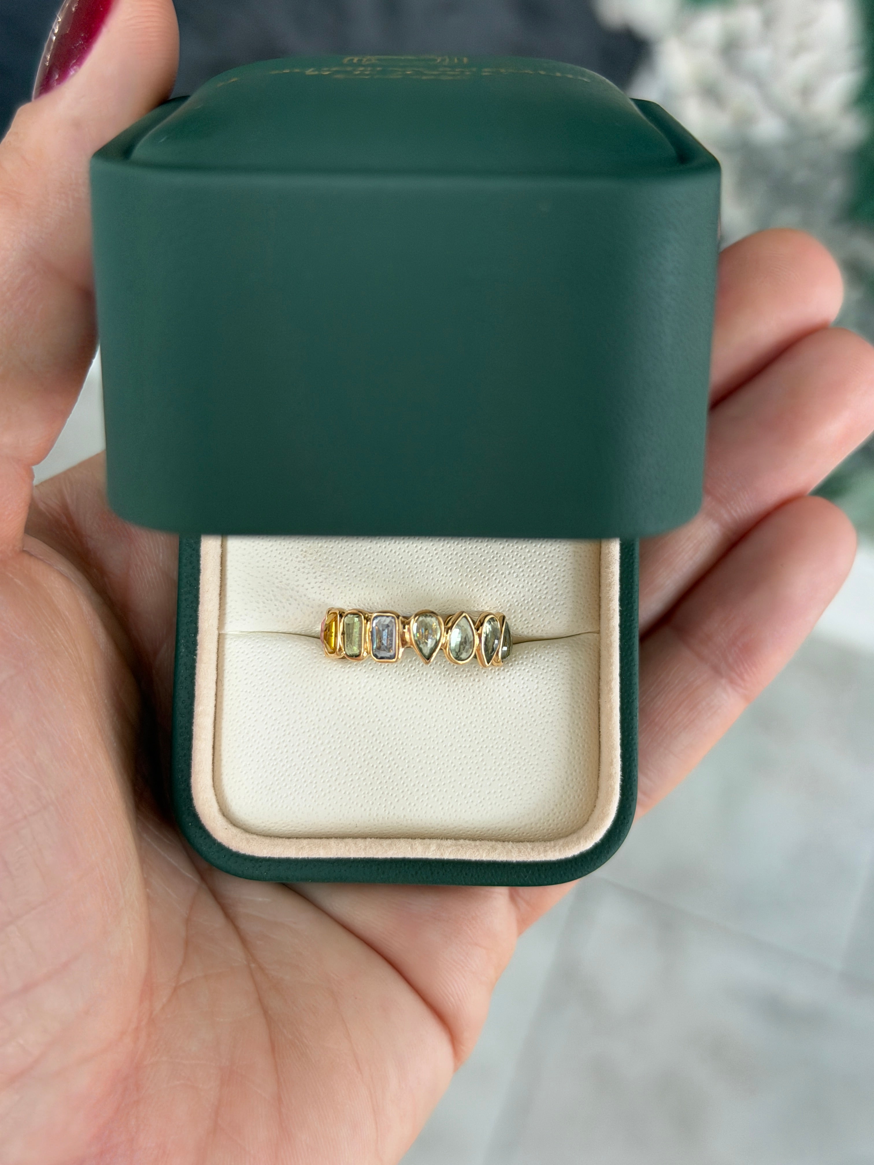 JR Colombian Emeralds pastel rainbow sapphire eternity band in 18K gold, size 6.5, featuring a low profile with inverted sapphires.