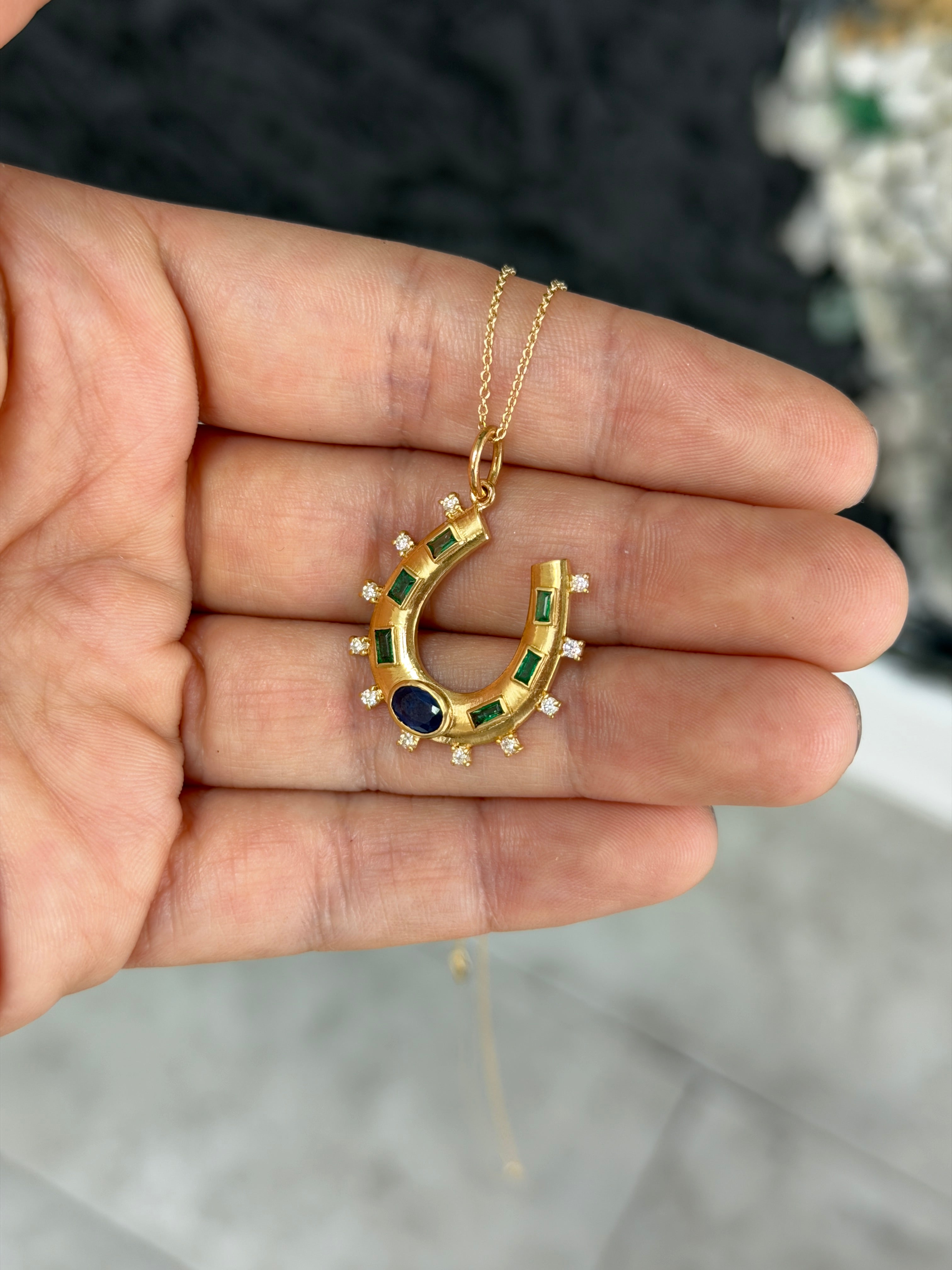 14K gold horseshoe charm pendant with 1.26ctw natural sapphire, emerald, and diamond accents, jewelry by JR Colombian Emeralds.