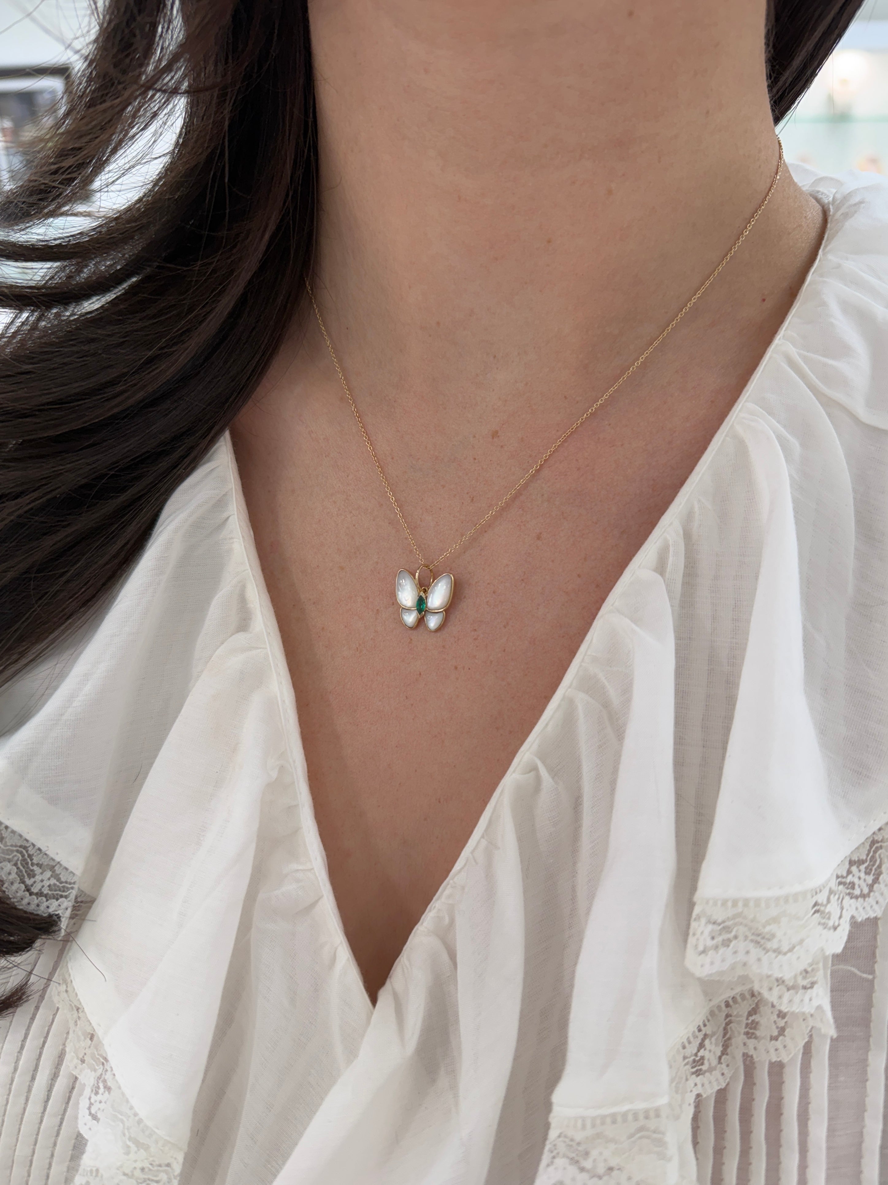 14K gold butterfly pendant with 2.90tcw marquise emeralds and mother of pearl accents, from JR Colombian Emeralds.