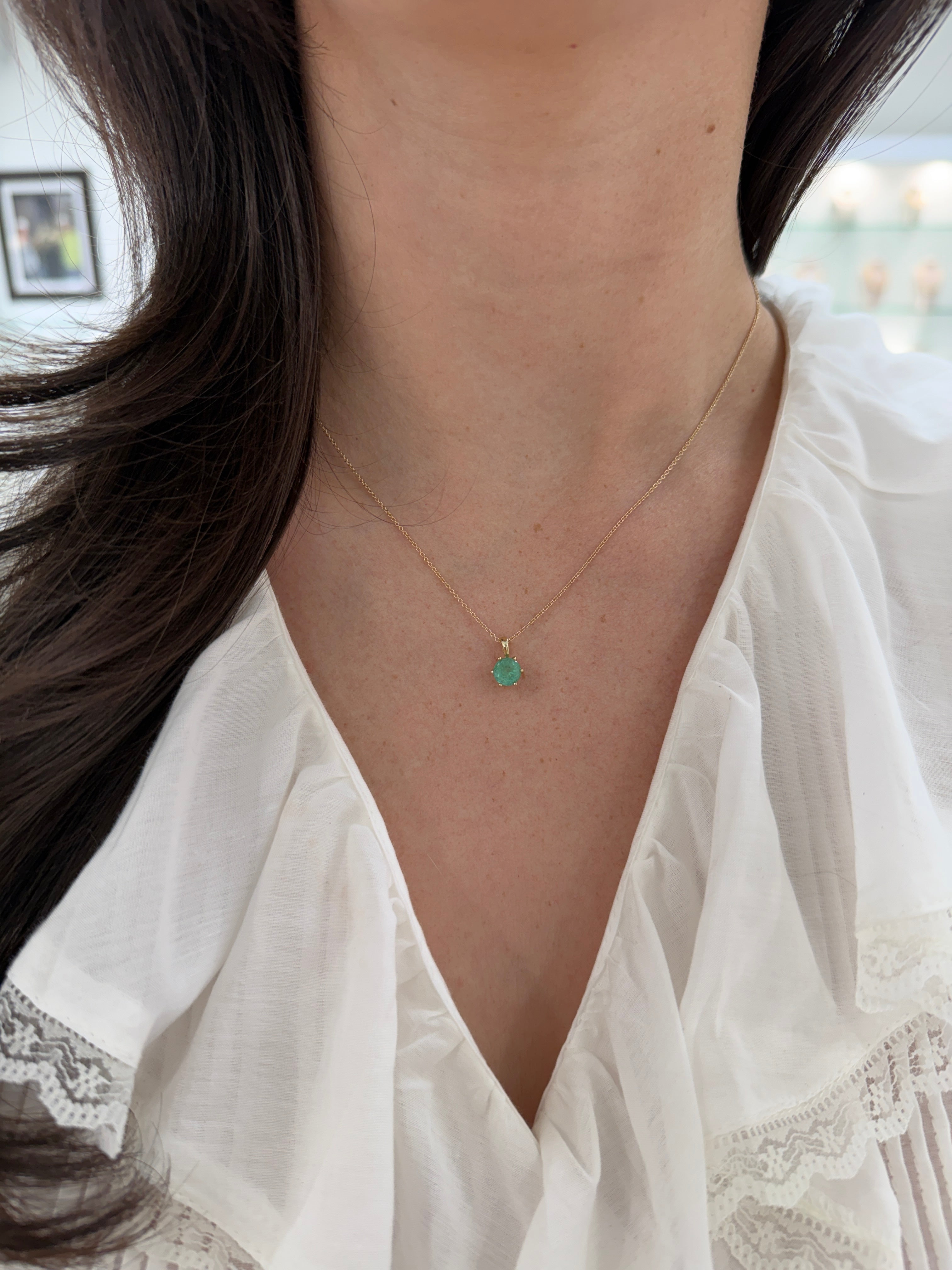 14K gold Tiffany-style emerald solitaire necklace with 1.14ct round emerald pendant, crafted by JR Colombian Emeralds.
