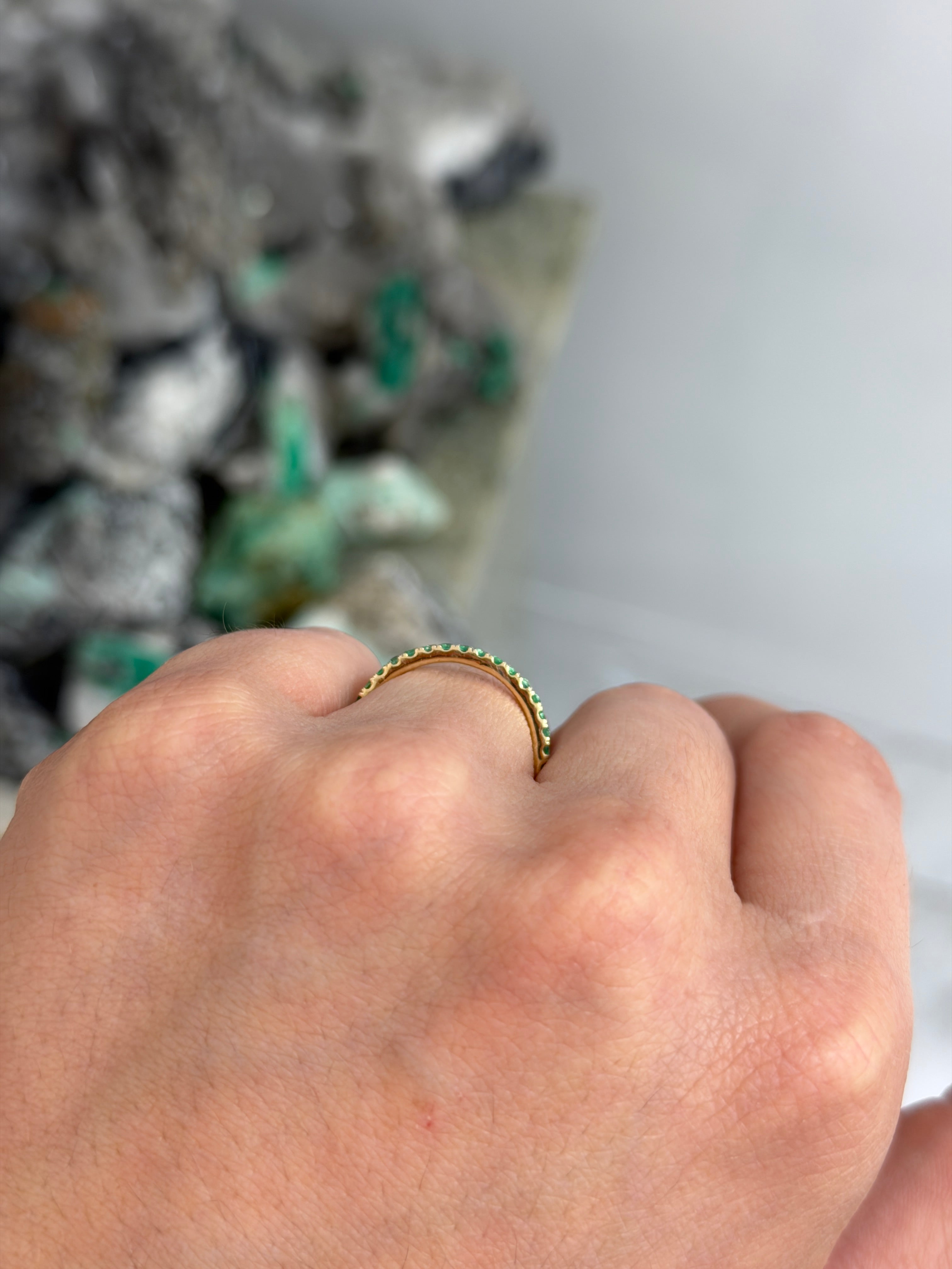 14K natural emerald eternity band with 0.70tcw, available in sizes 6, 7, 8, featuring JR Colombian Emeralds craftsmanship.