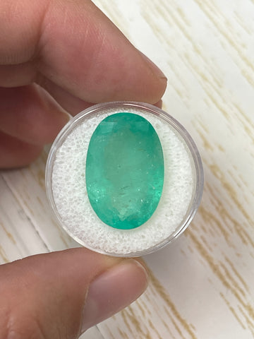 Vivid 15.65 Carat Colombian Emerald - Oval Shaped, Earthy Green Hue