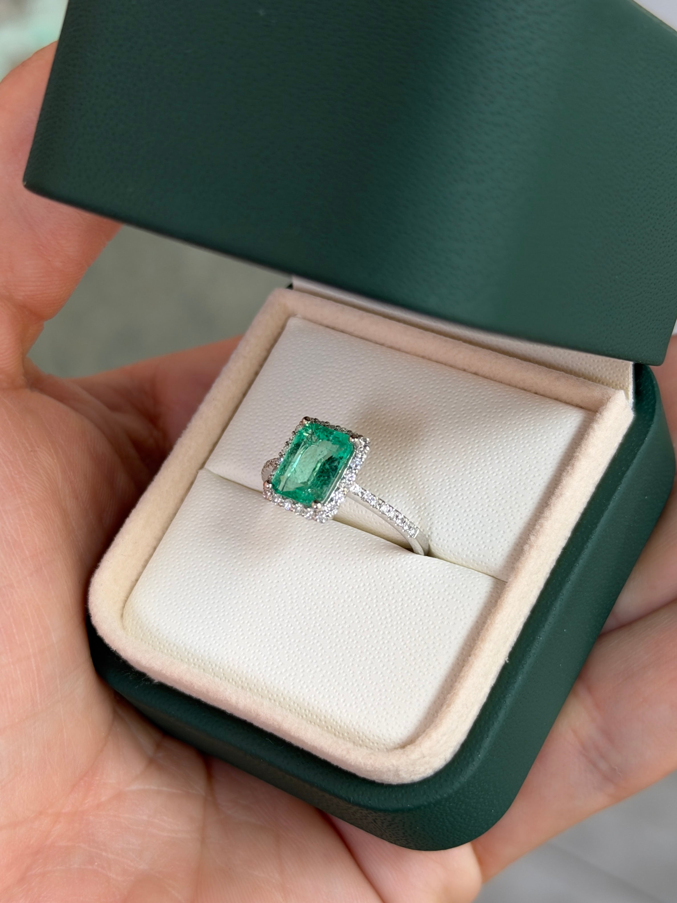 14K white gold Colombian emerald and diamond halo engagement ring with 1.70tcw crystal clear emerald from JR Colombian Emeralds.