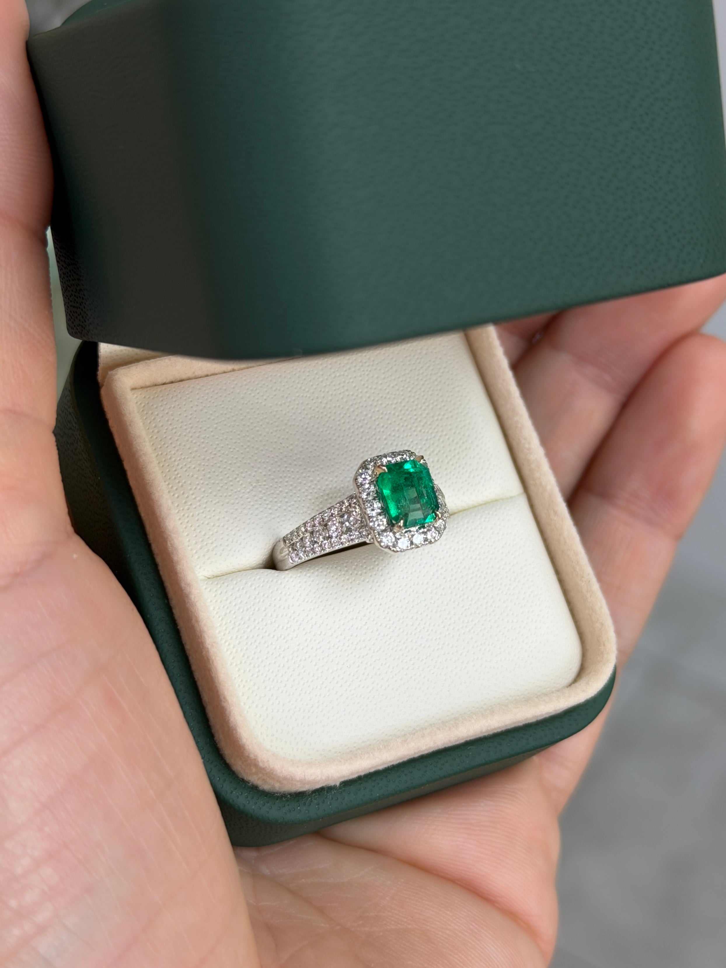 14K gold engagement ring featuring a 2.21tcw Chivor bluish green Colombian emerald with diamond halo, by JR Colombian Emeralds.