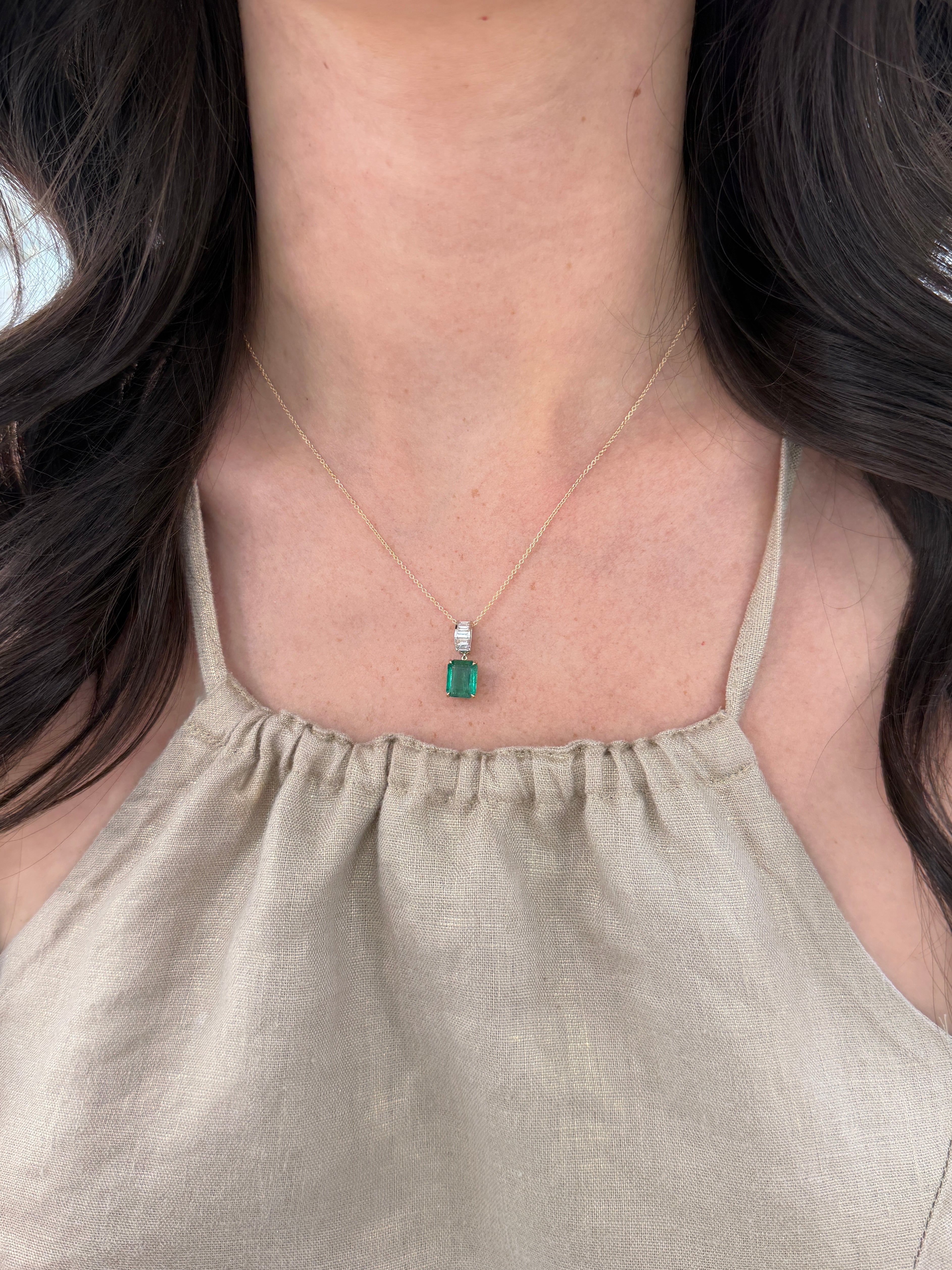 Natural emerald and lab diamond baguette bail pendant in 14K gold, featuring 3.57 carats from JR Colombian Emeralds.