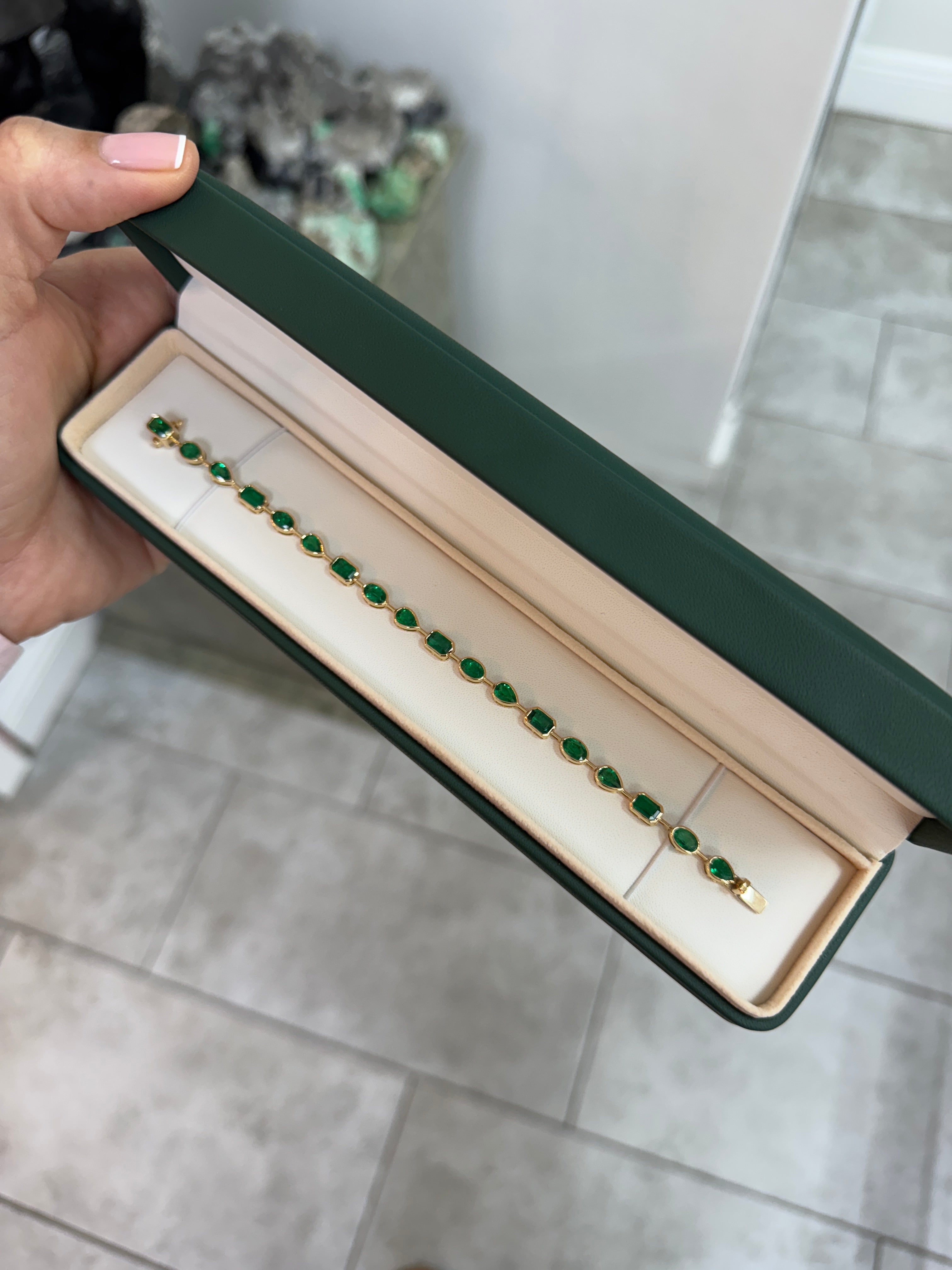 7.93tcw 18K Emerald Mixed Shape Tennis Bracelet- 7 Inches