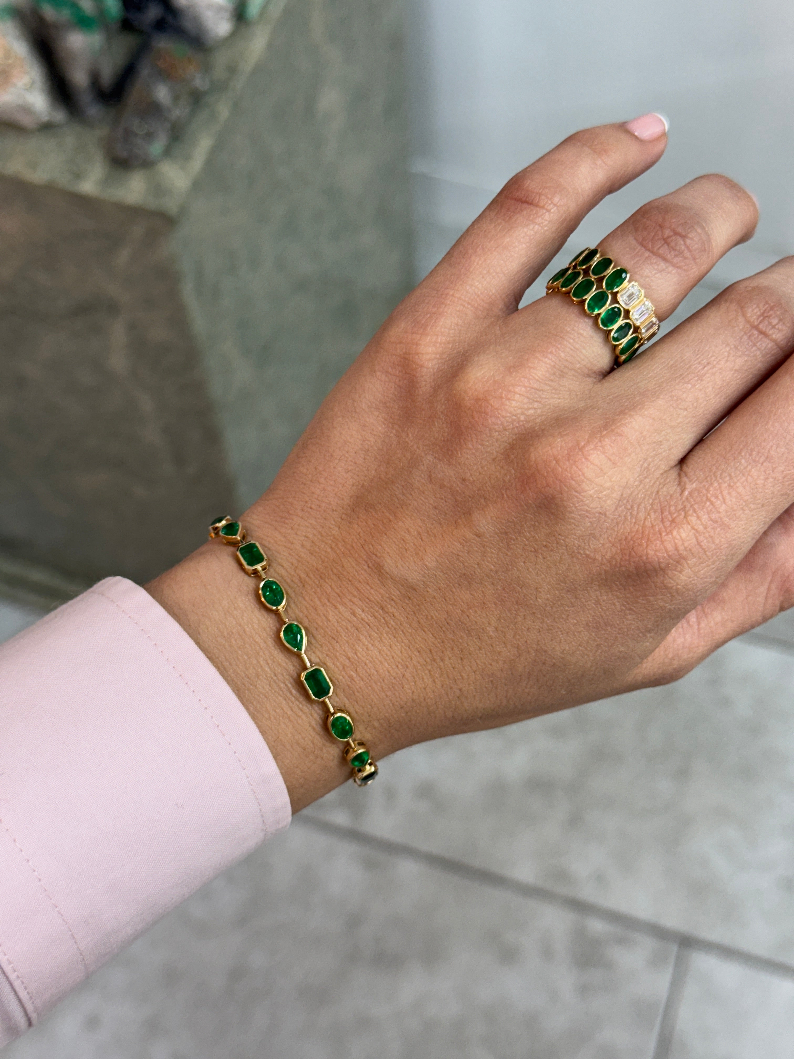 7.93tcw 18K Emerald Mixed Shape Tennis Bracelet- 7 Inches