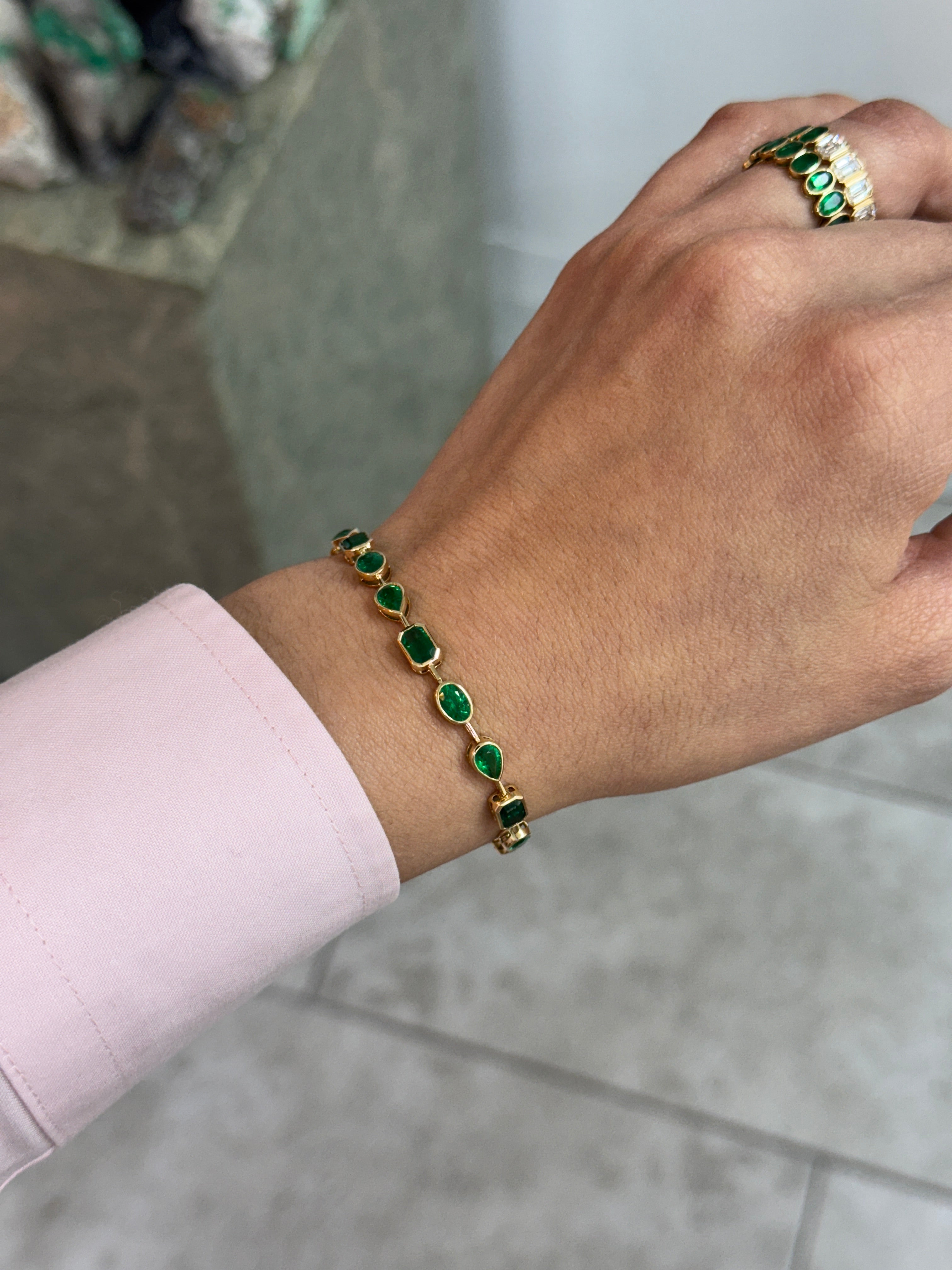 7.93tcw 18K Emerald Mixed Shape Tennis Bracelet- 7 Inches