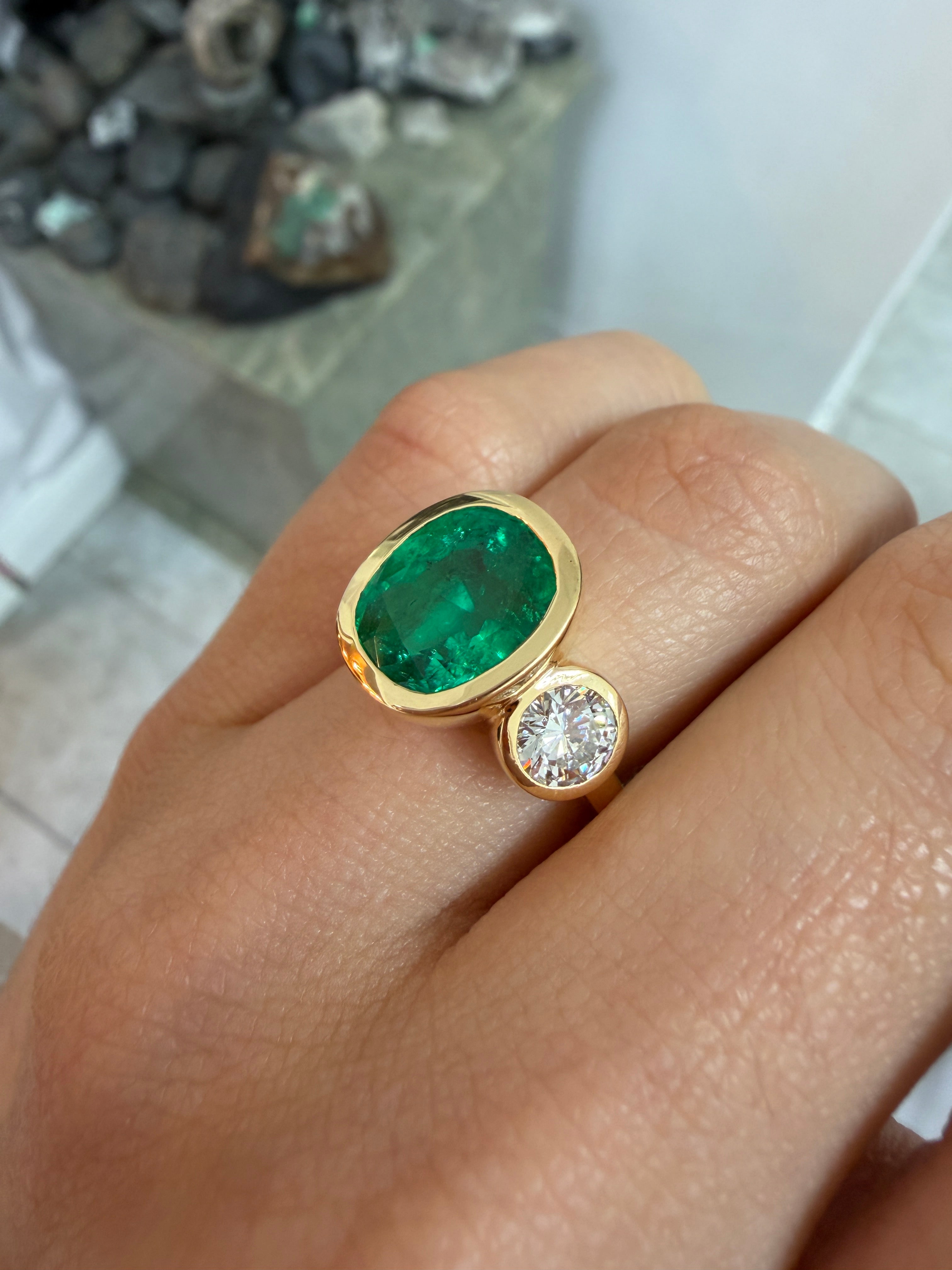 7.33tcw 18K Exclusive Cushion Colombian Emerald & Brilliant Round Diamond Three Stone Ring