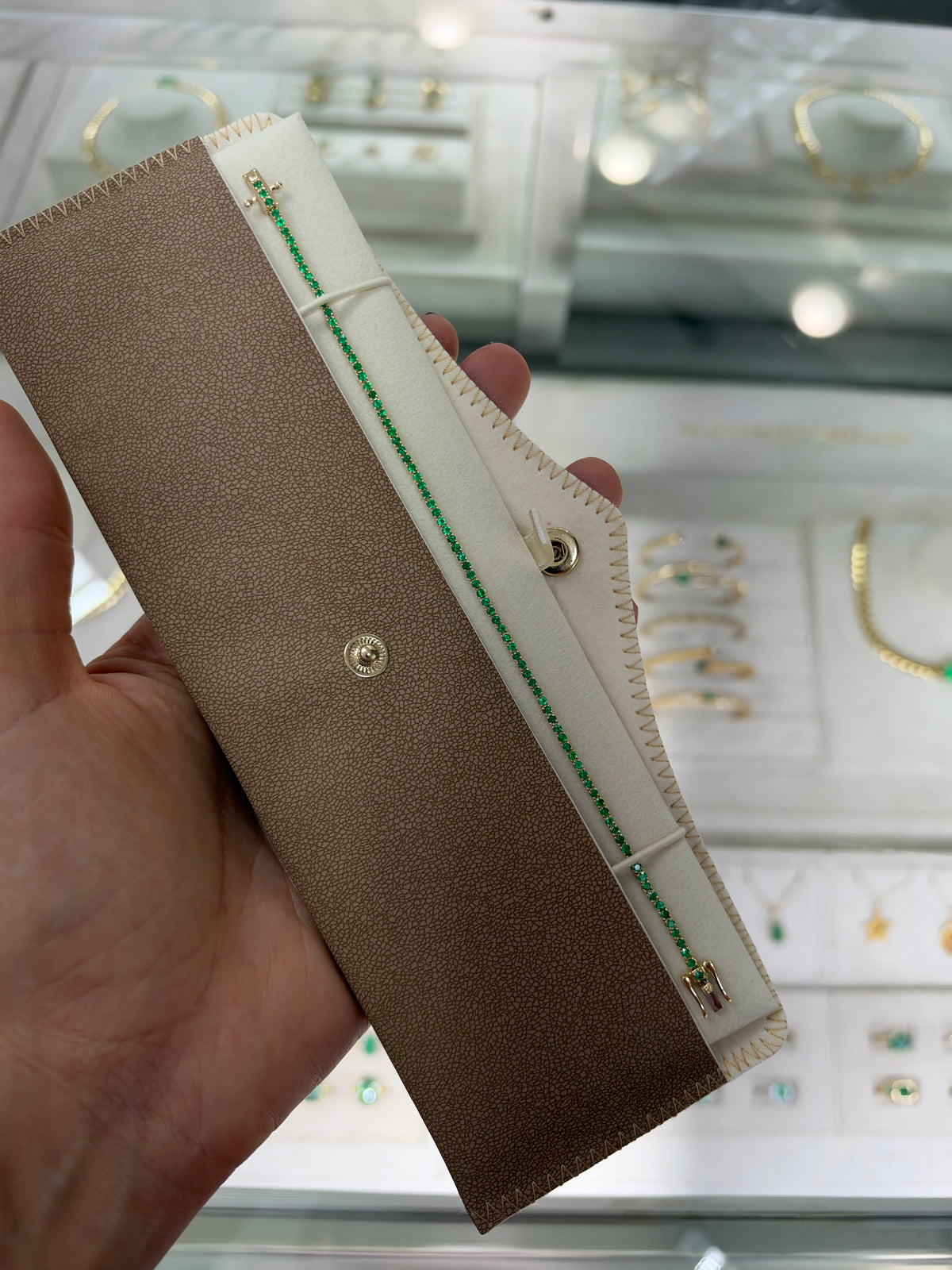 Petite 1.72tcw round emerald tennis bracelet in 14K gold, 7-inch length, from JR Colombian Emeralds.