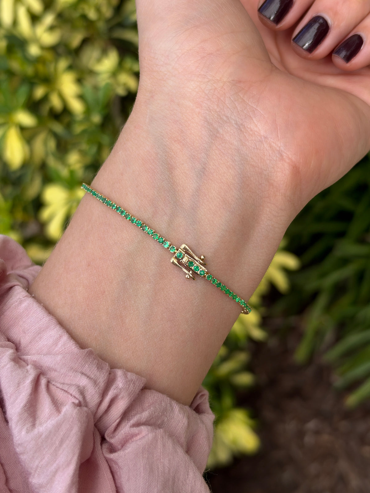 Petite 1.72tcw round emerald tennis bracelet in 14K gold by JR Colombian Emeralds, 7-inch length, showcasing sparkling green gemstones.