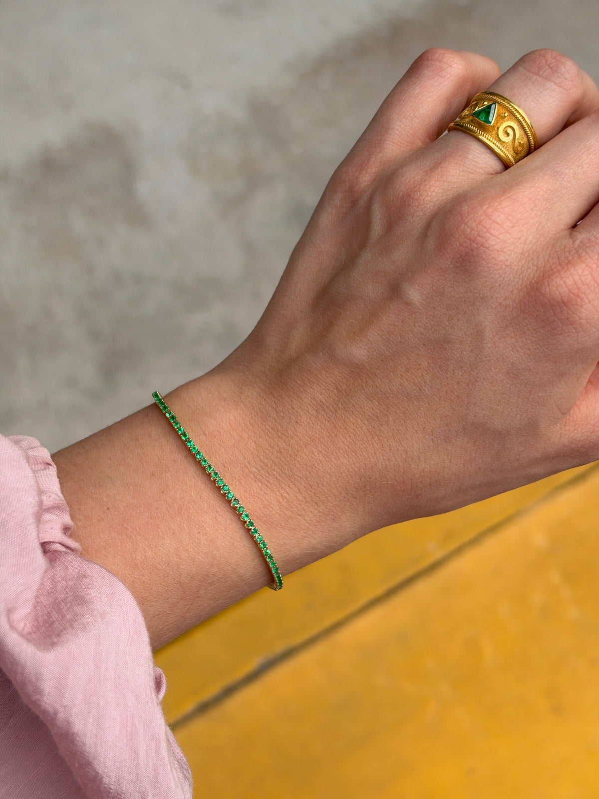 Petite 1.72tcw round emerald tennis bracelet in 14K gold by JR Colombian Emeralds, 7-inch length, showcasing elegant gemstone design.