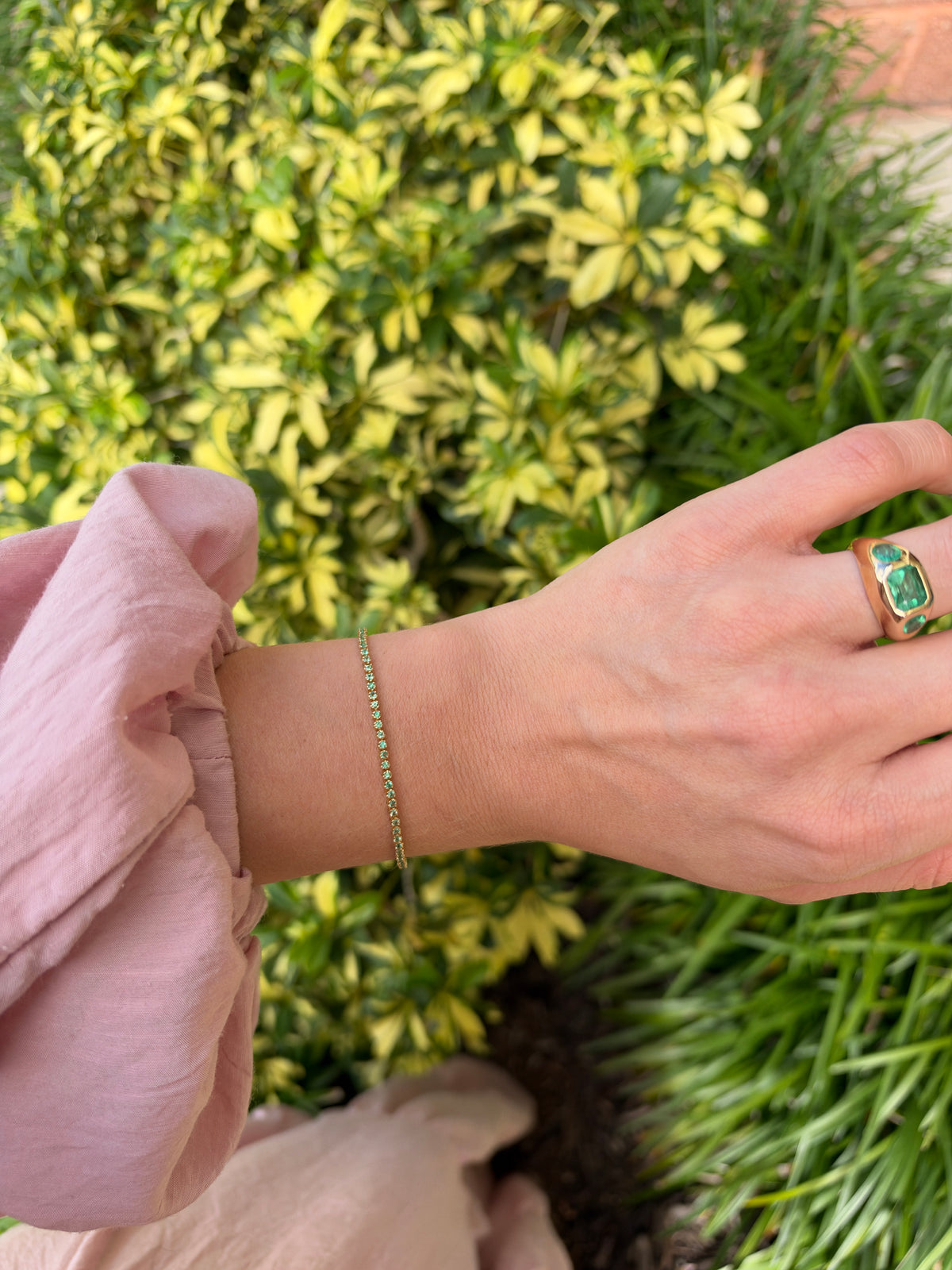 Petite light green round emerald tennis bracelet with 0.63 carats in 14K gold, 7-inch length by JR Colombian Emeralds.