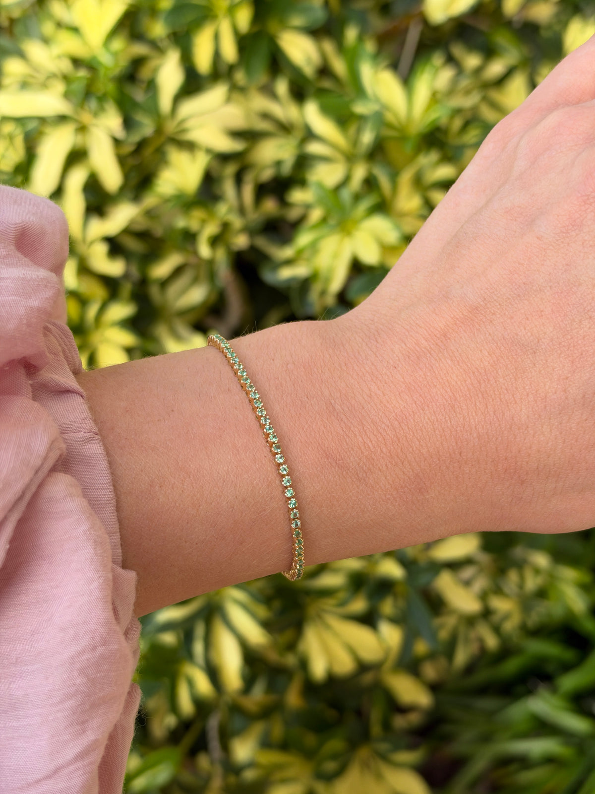 Light green round emerald tennis bracelet with 0.63tcw, 14K gold, 7-inch petite design by JR Colombian Emeralds.