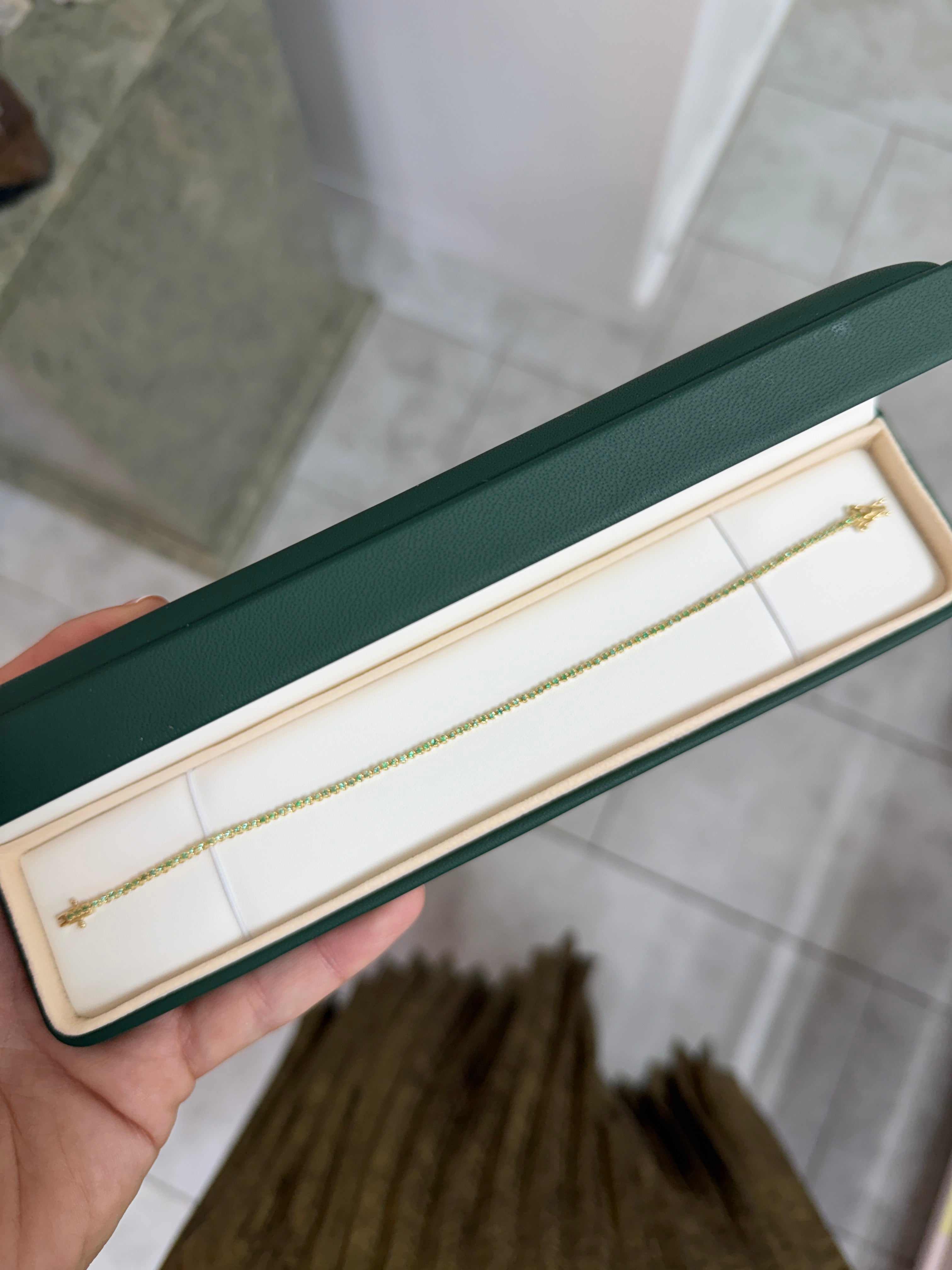 Petite emerald tennis bracelet in 14K gold with 1.13 carats of natural green emeralds, 7-inch length