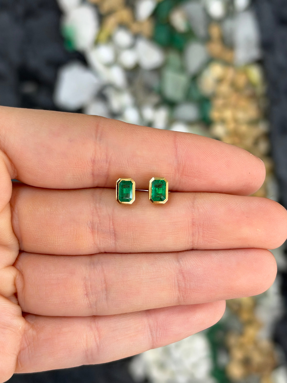 14K natural bezel set emerald cut emerald stud earrings with 1.20tcw from JR Colombian Emeralds, showcasing elegant gemstone jewelry