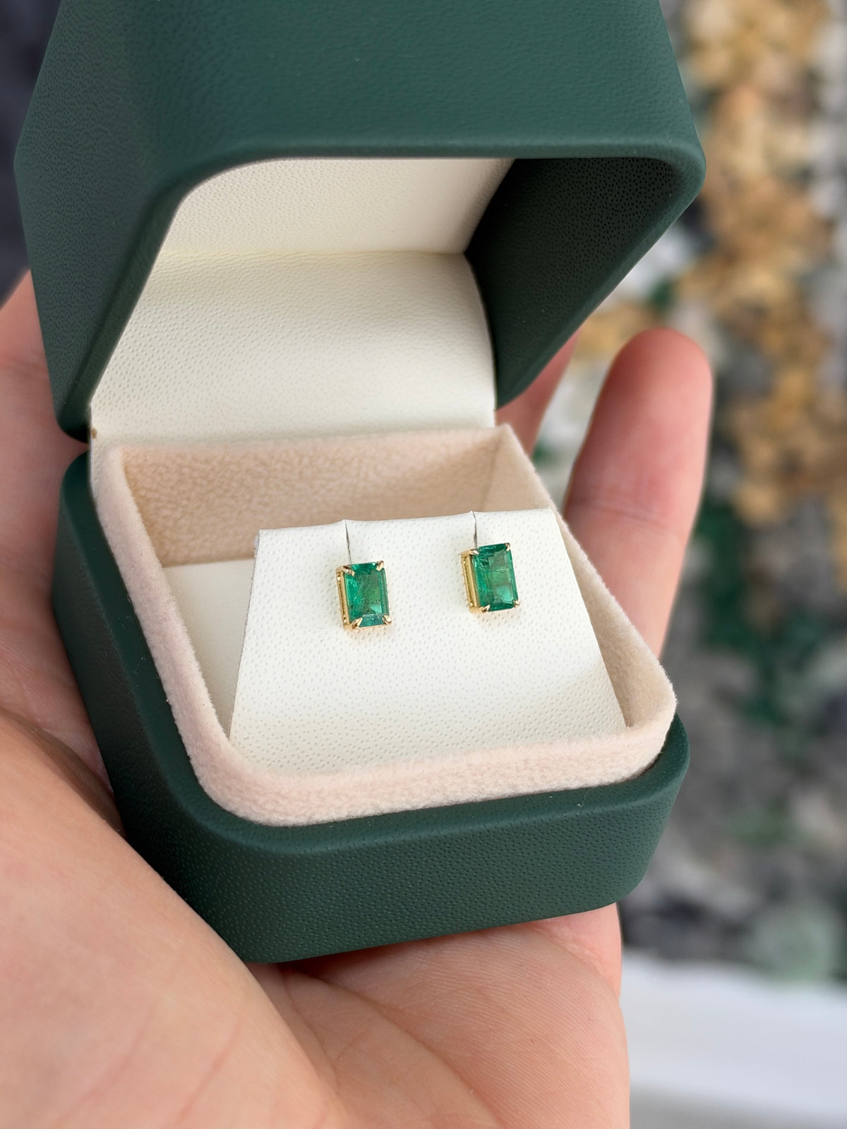 Medium green Zambian emerald cut stud earrings with 1.0tcw in 14K gold, featuring elegant emerald design by JR Colombian Emeralds.