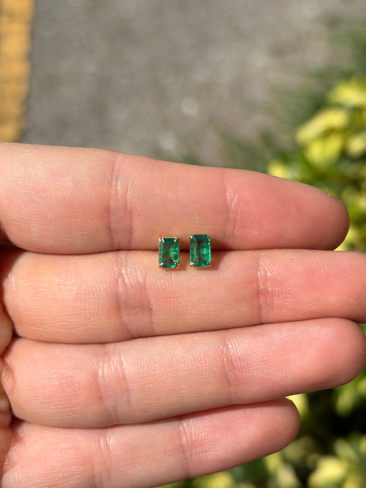 Medium green Zambian emerald cut stud earrings, 1.0 tcw, set in 14K gold, from JR Colombian Emeralds.