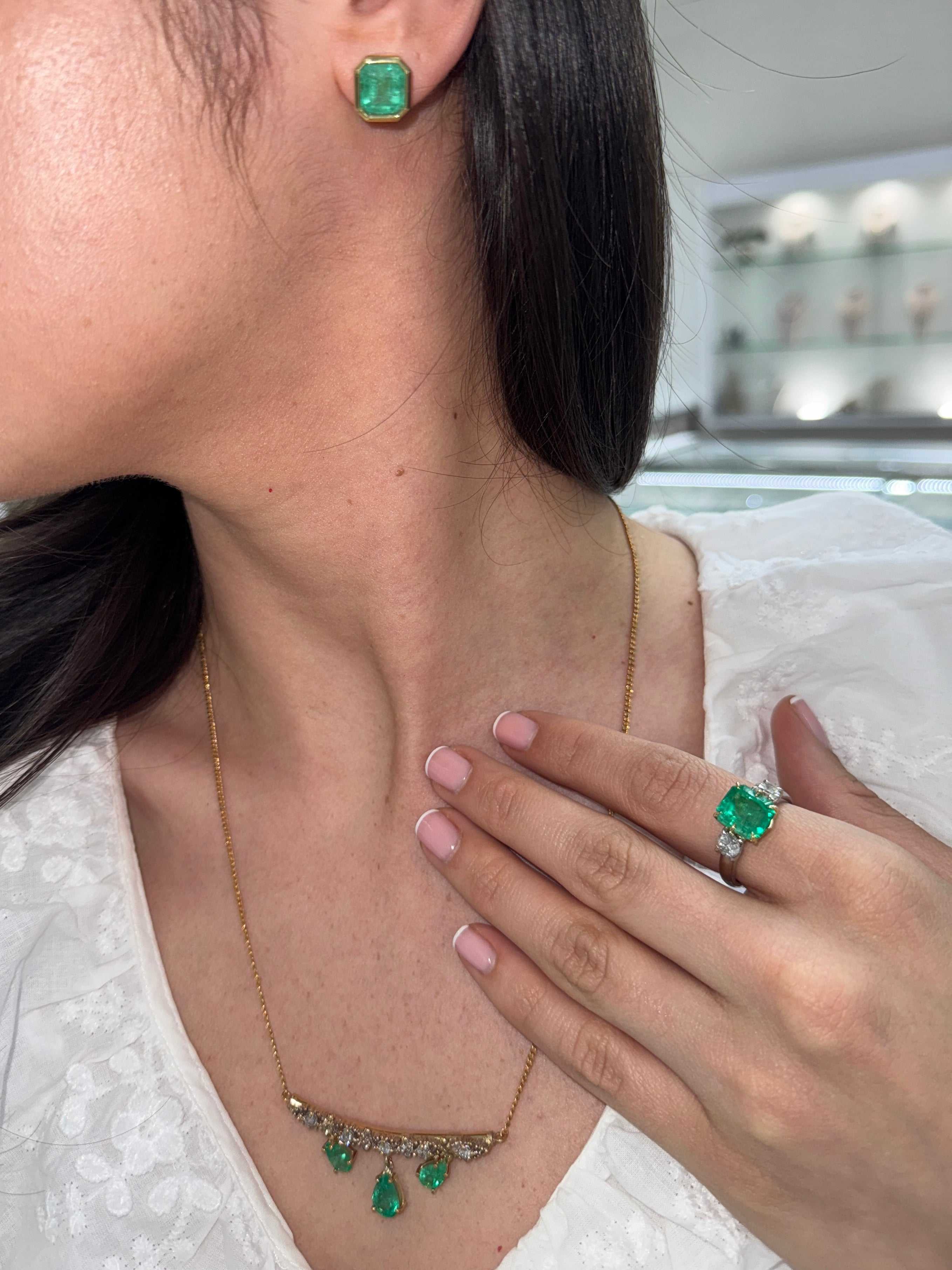 5.20tcw 18K Vivid Colombian Emerald Asscher & Diamond Three Stone Ring