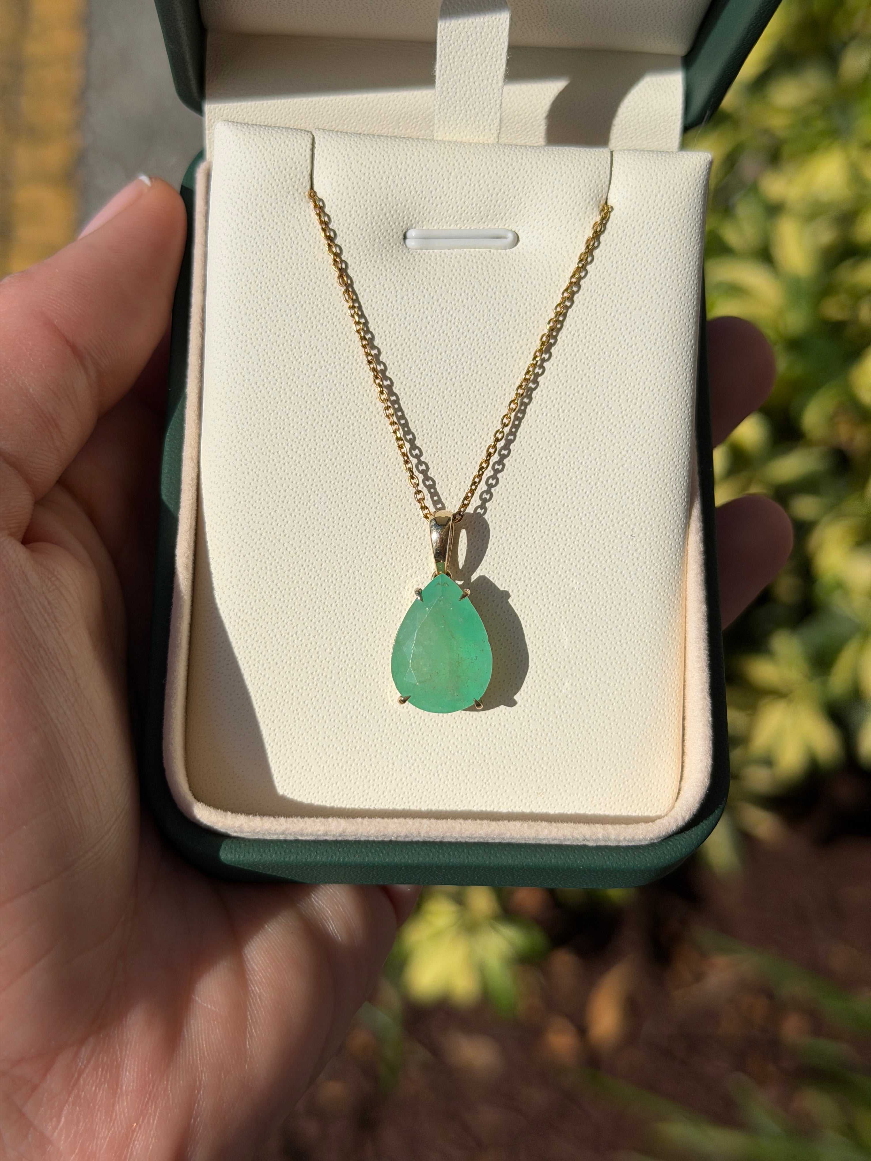 8.20 carat earthy Colombian emerald teardrop pendant necklace in 14K yellow gold with adjustable chain