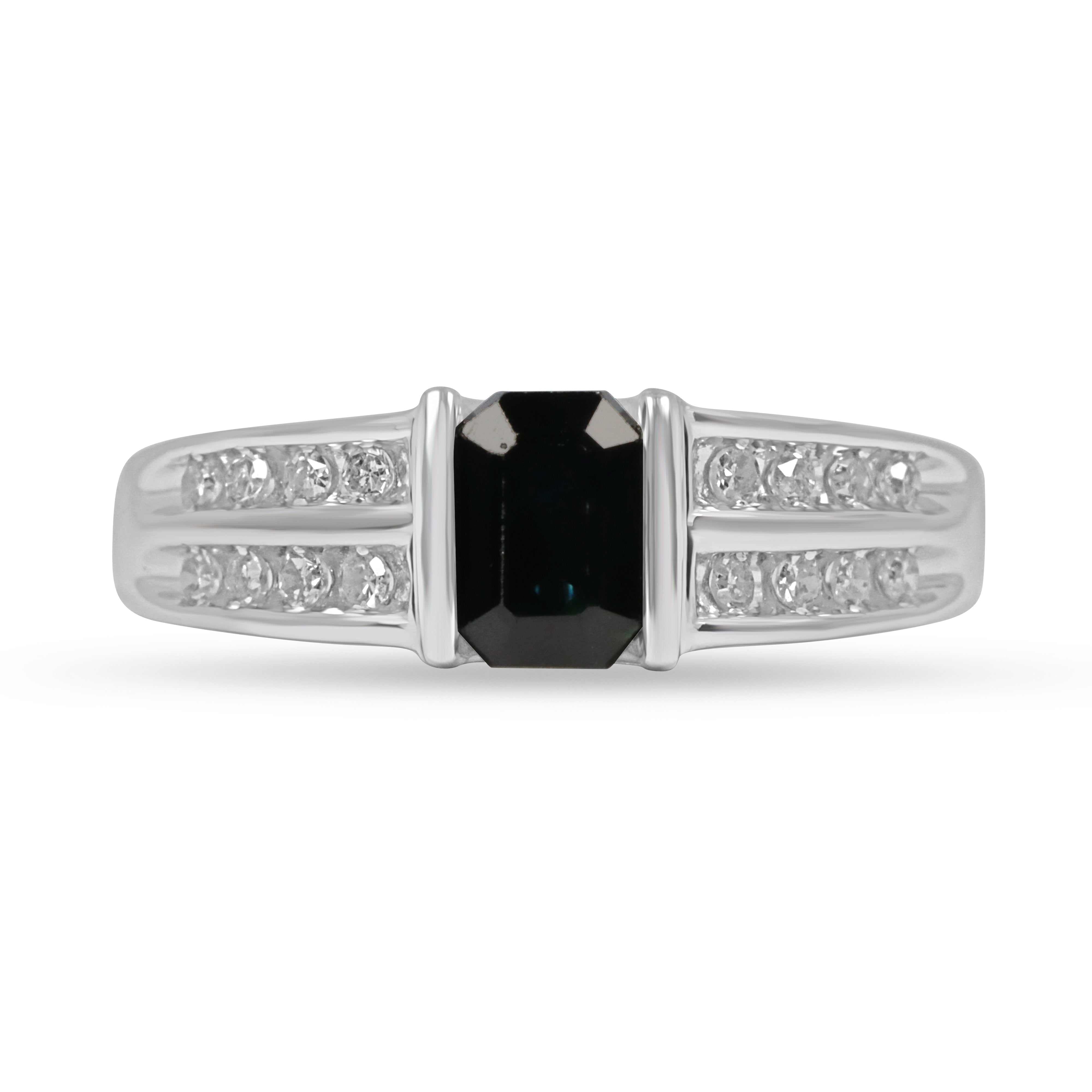14K white gold ring with emerald cut natural dark blue sapphire and channel-set round diamonds
