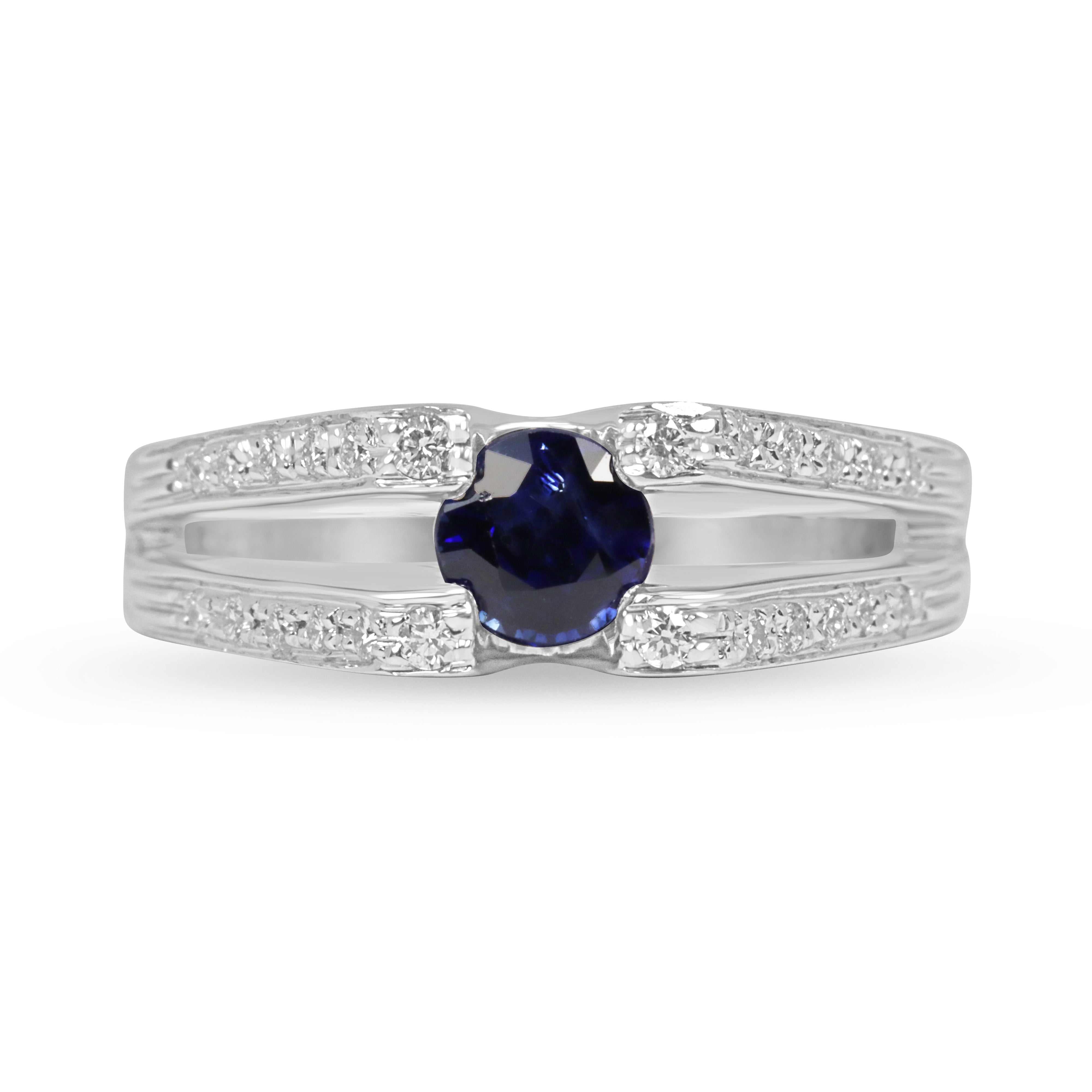 18K white gold ring with natural purple-blue tanzanite and diamond accents