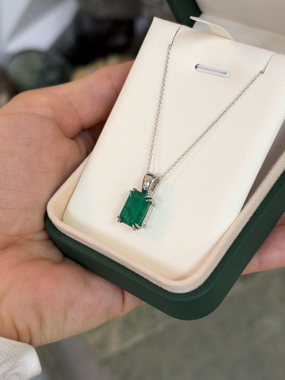 4.42ct Platinum Jungle Green Emerald Cut Emerald Solitaire Double Claw Prong Necklace