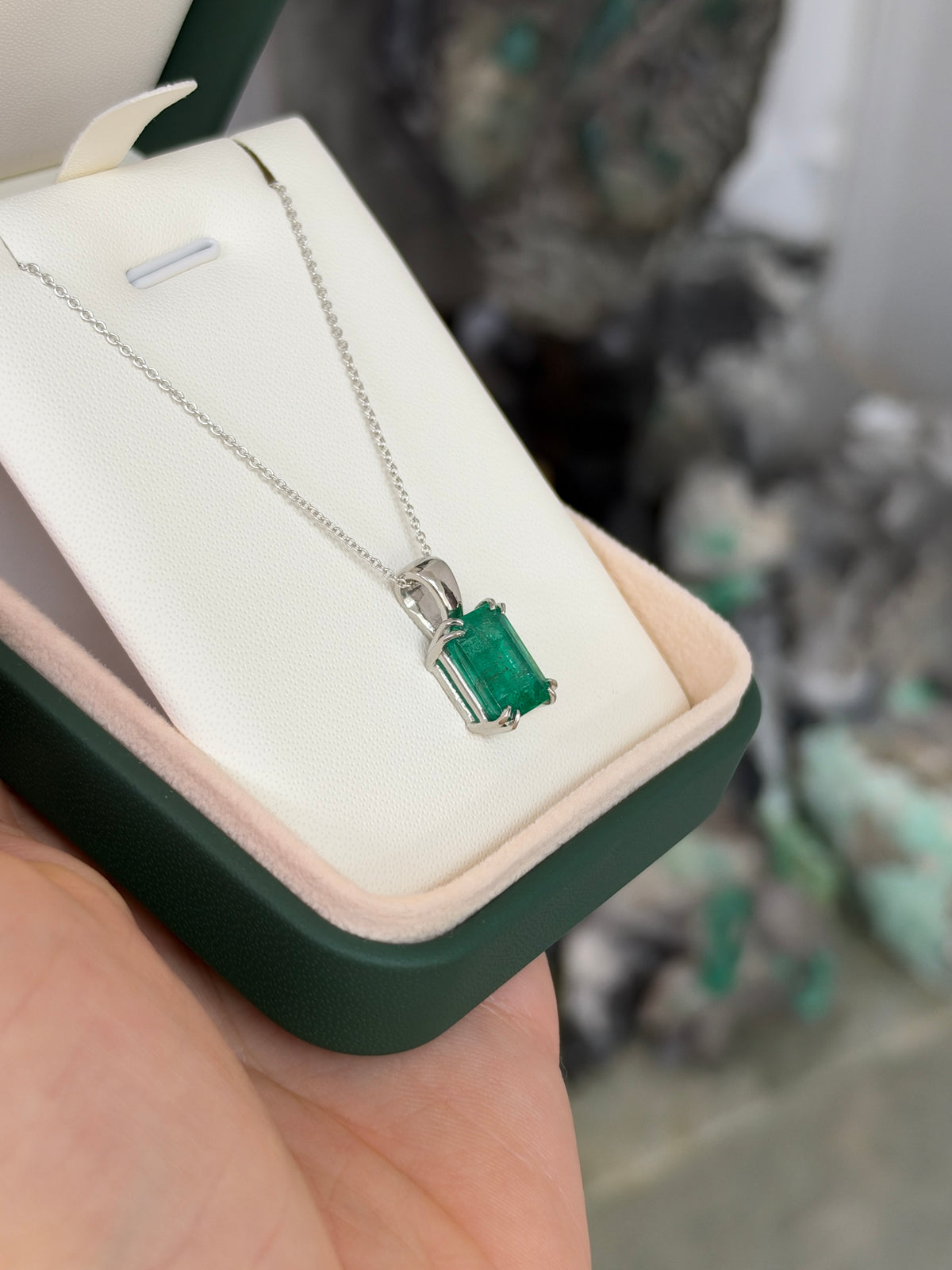 4.42ct Platinum Jungle Green Emerald Cut Emerald Solitaire Double Claw Prong Necklace
