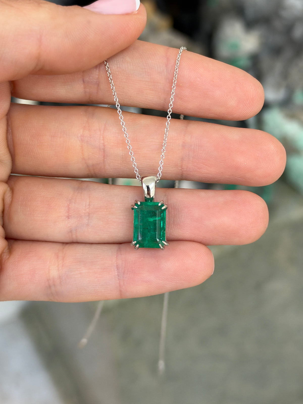 4.42ct Platinum Jungle Green Emerald Cut Emerald Solitaire Double Claw Prong Necklace