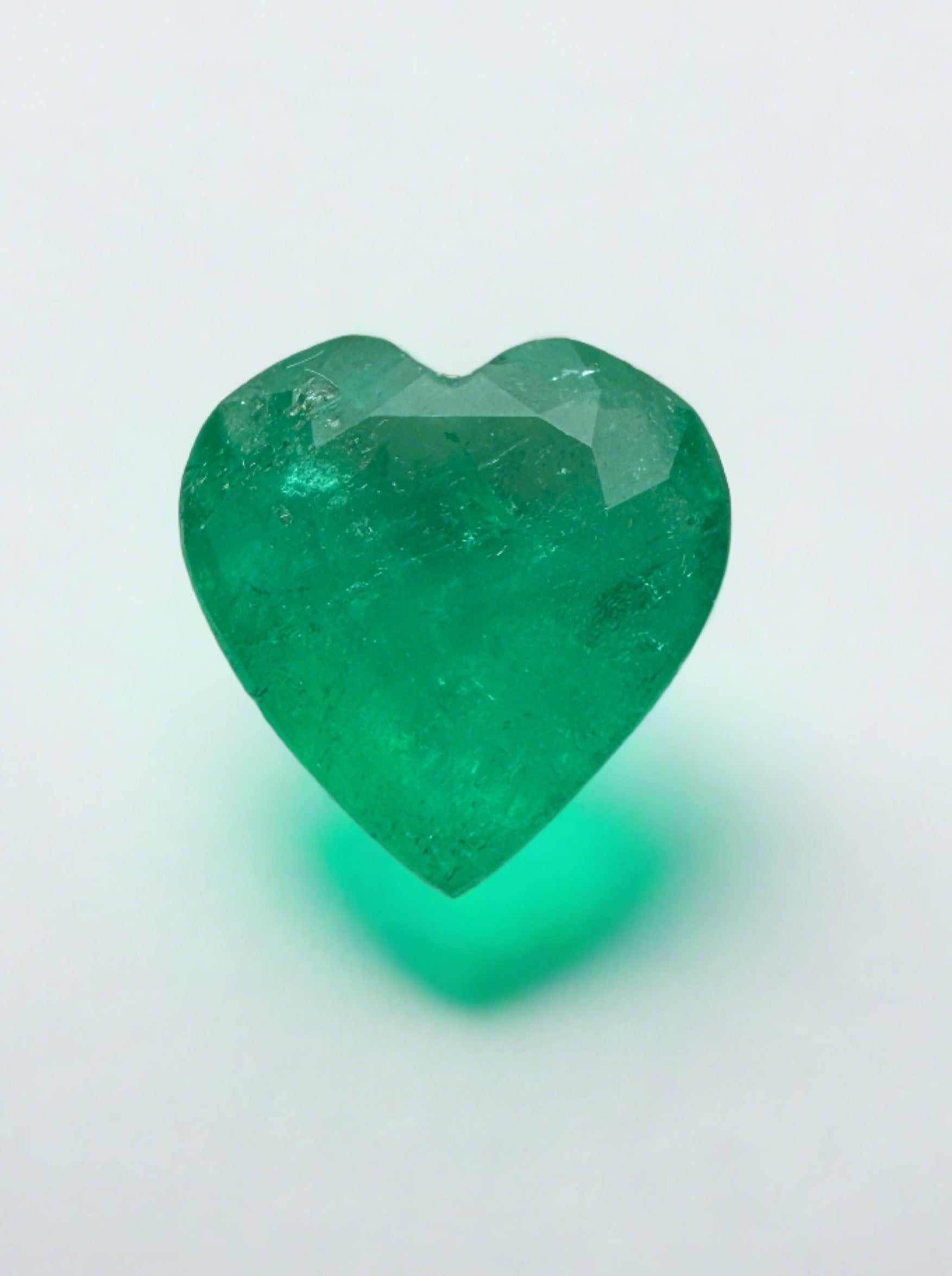 Monse 50% Deposit 2.52 carat heart-shaped natural Colombian emerald with medium green color and semi-transparent clarity