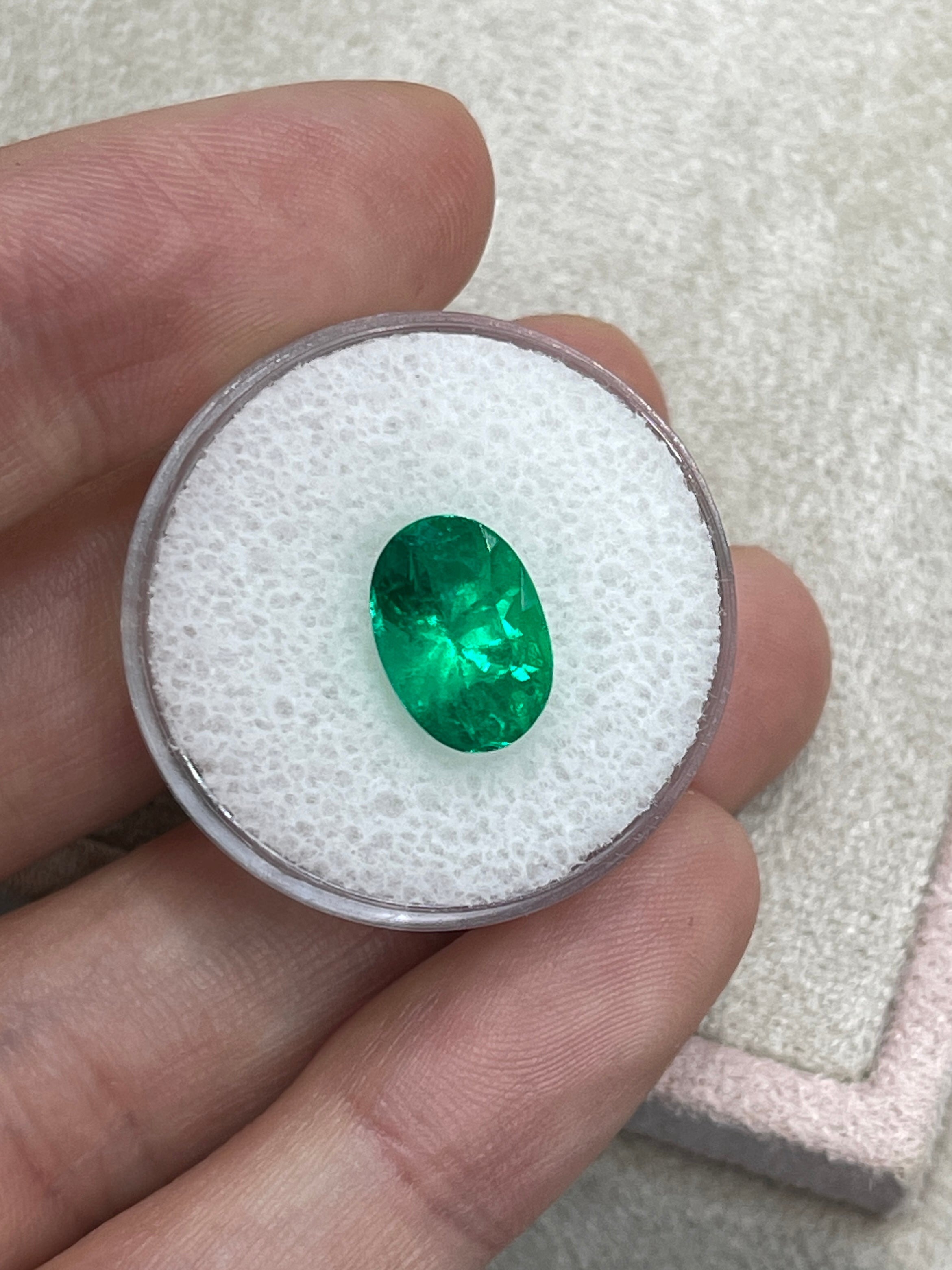 3.24 Carat AAA+ 11.4x8 Vivid Yellowish Green Oval Colombian Emerald