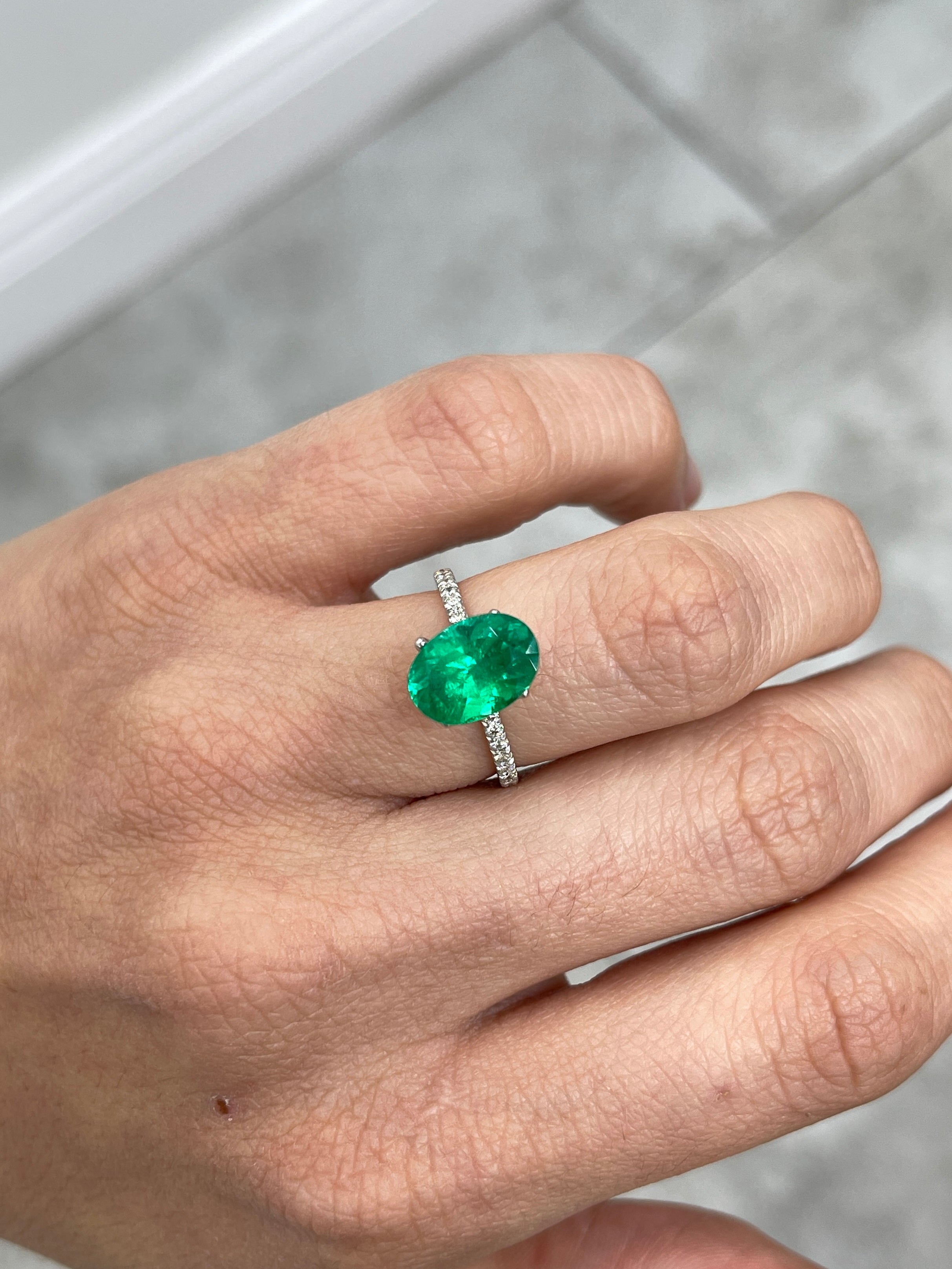 3.24 Carat AAA+ 11.4x8 Vivid Yellowish Green Oval Colombian Emerald