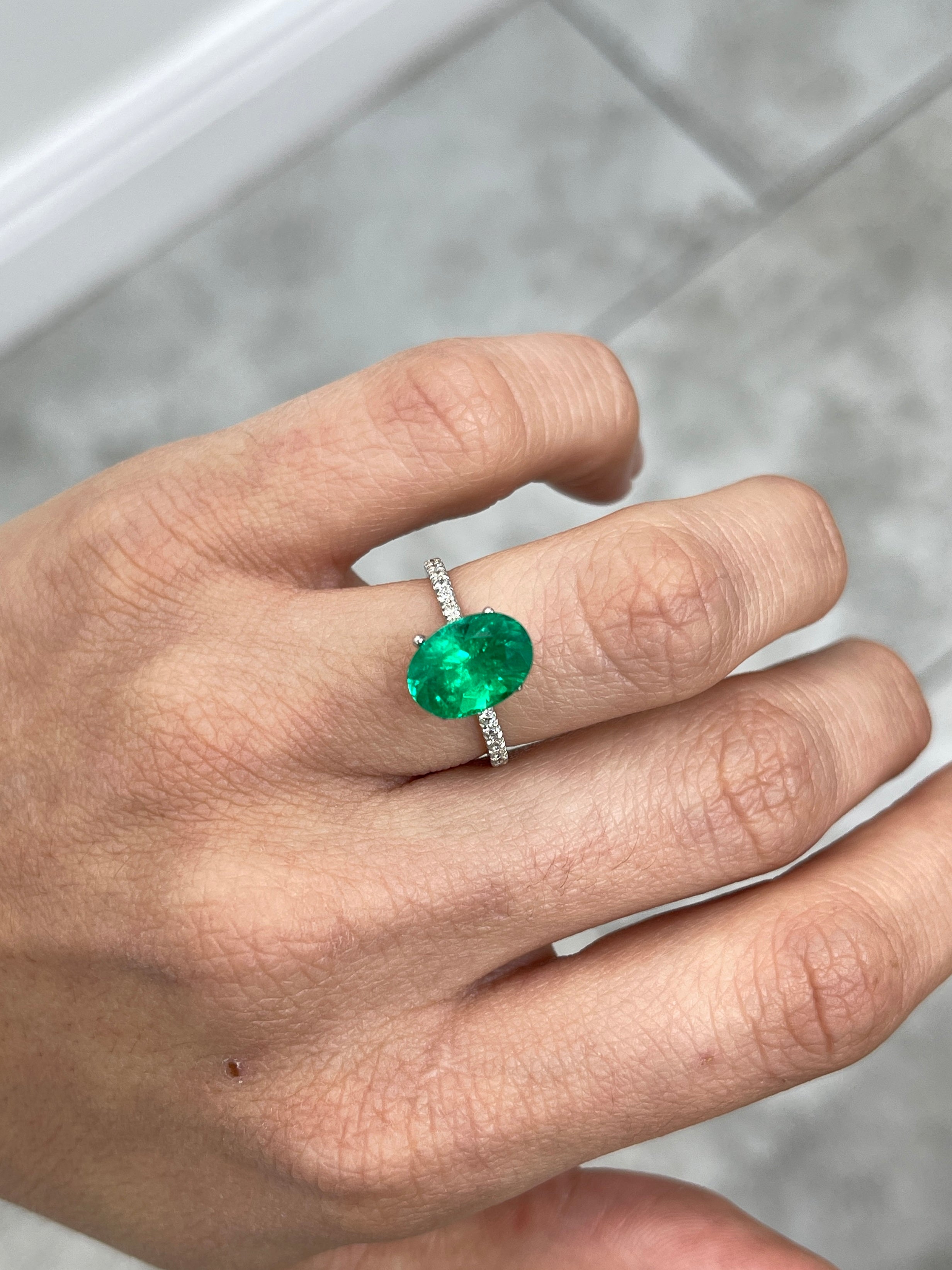 3.24 Carat AAA+ 11.4x8 Vivid Yellowish Green Oval Colombian Emerald
