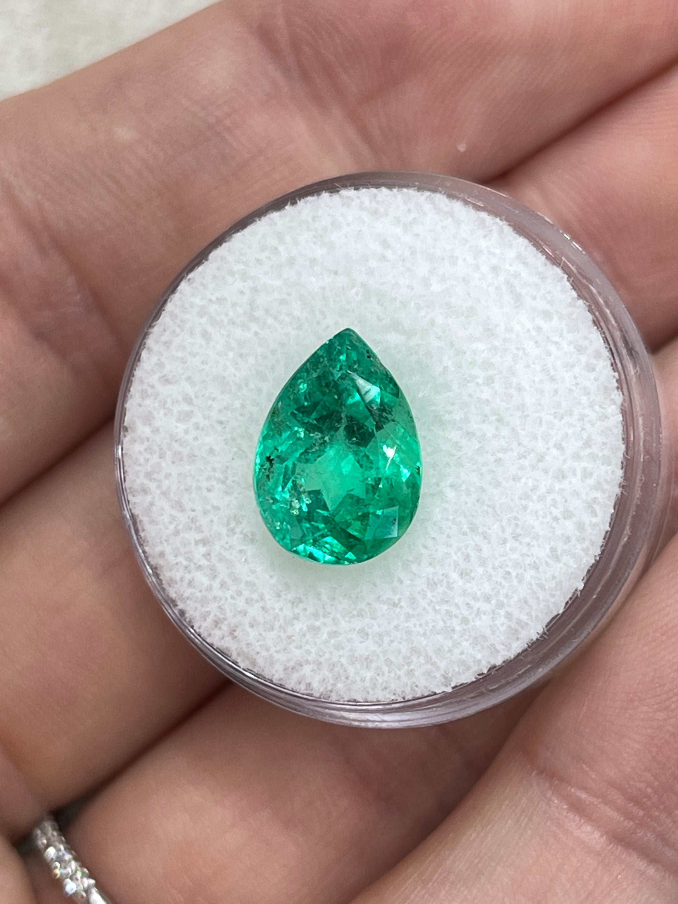 4.09 Carat 12x9 Freckled Bluish Green Pear Loose Colombian Emerald