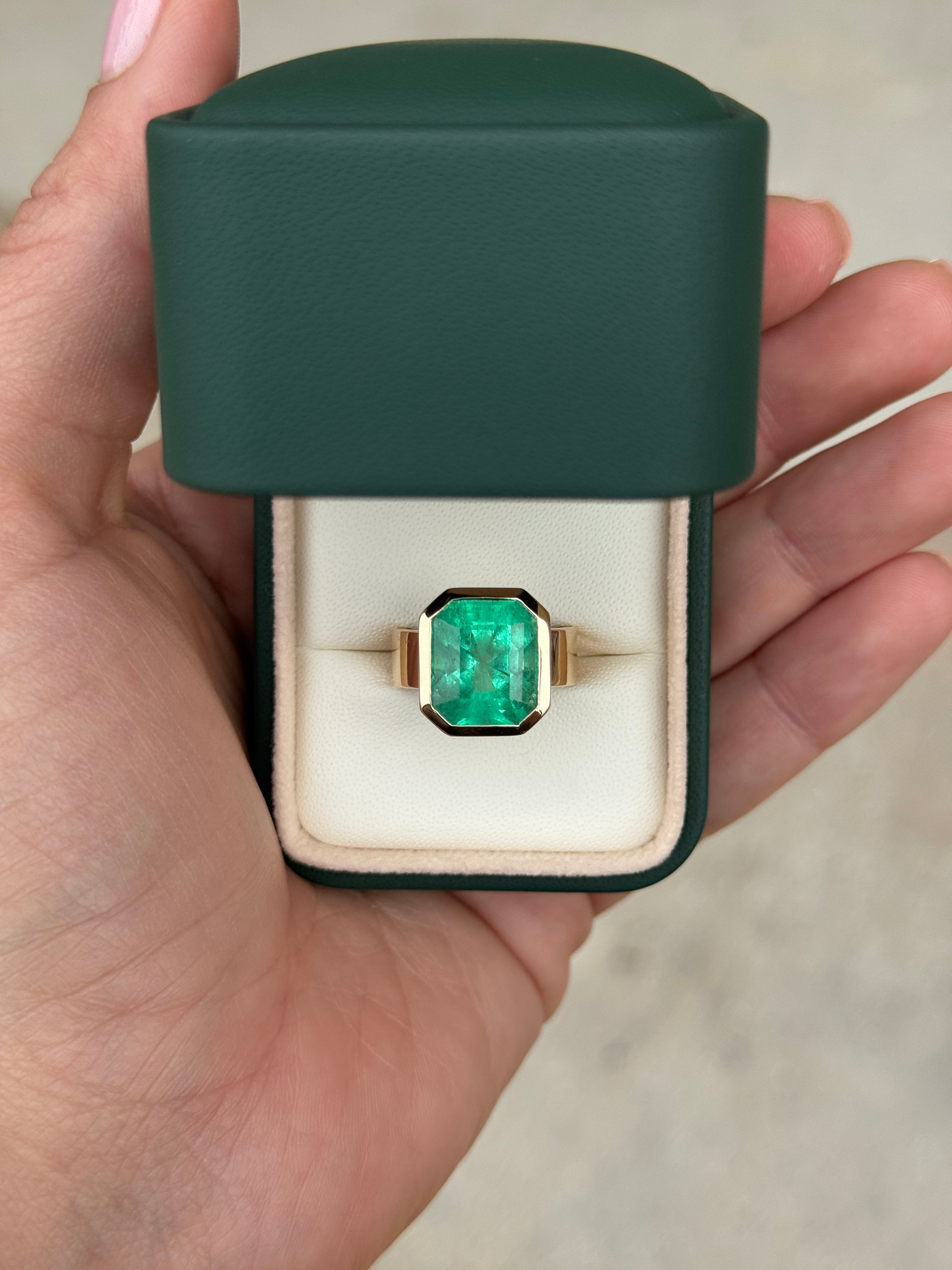 8.15 Carat Ultra Bright Colombian Emerald Solitaire Ring Emerald Cut Bezel Set 18K Gold 6.3mm Wide