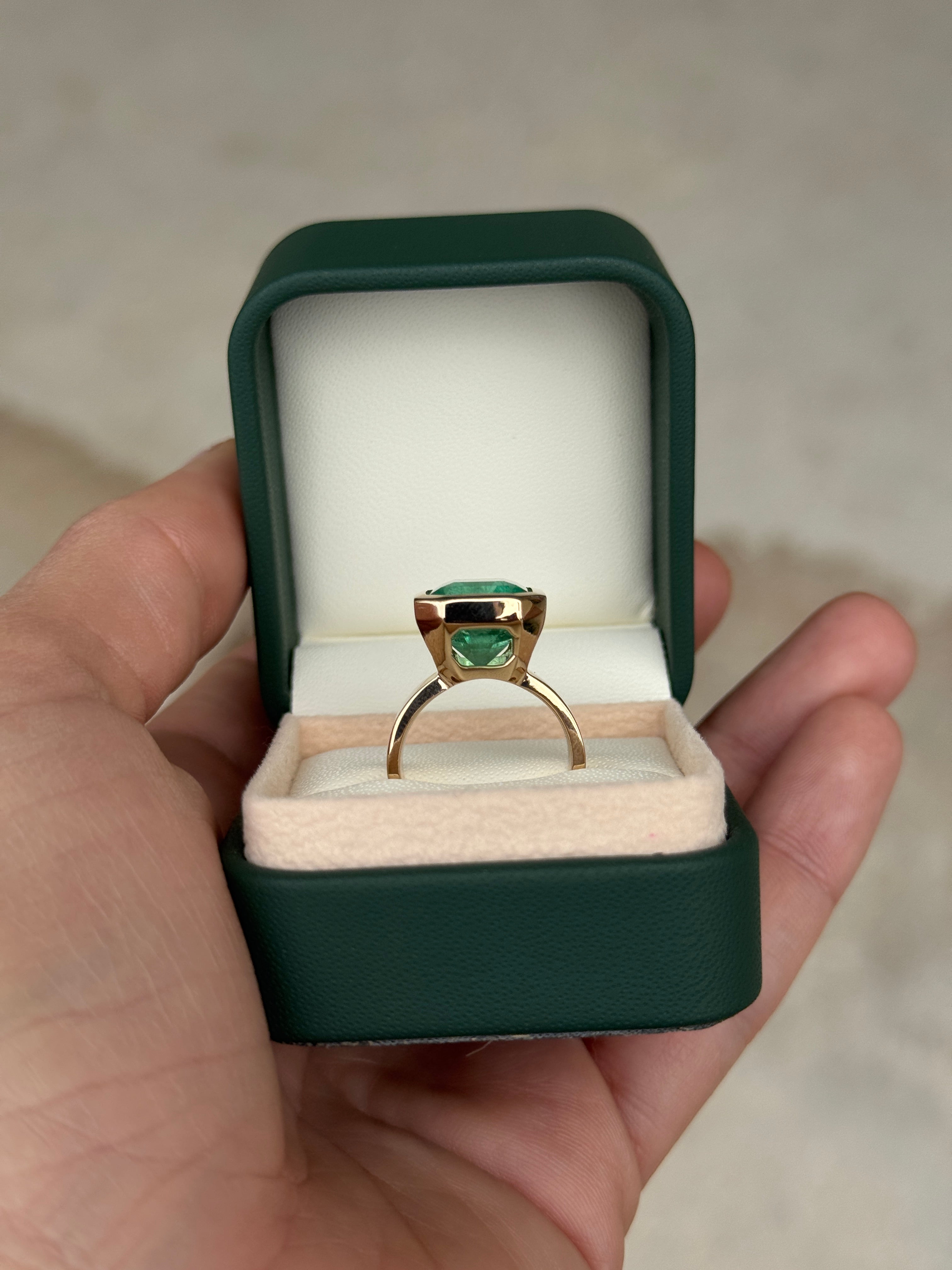 8.15 Carat Ultra Bright Colombian Emerald Solitaire Ring Emerald Cut Bezel Set 18K Gold 6.3mm Wide