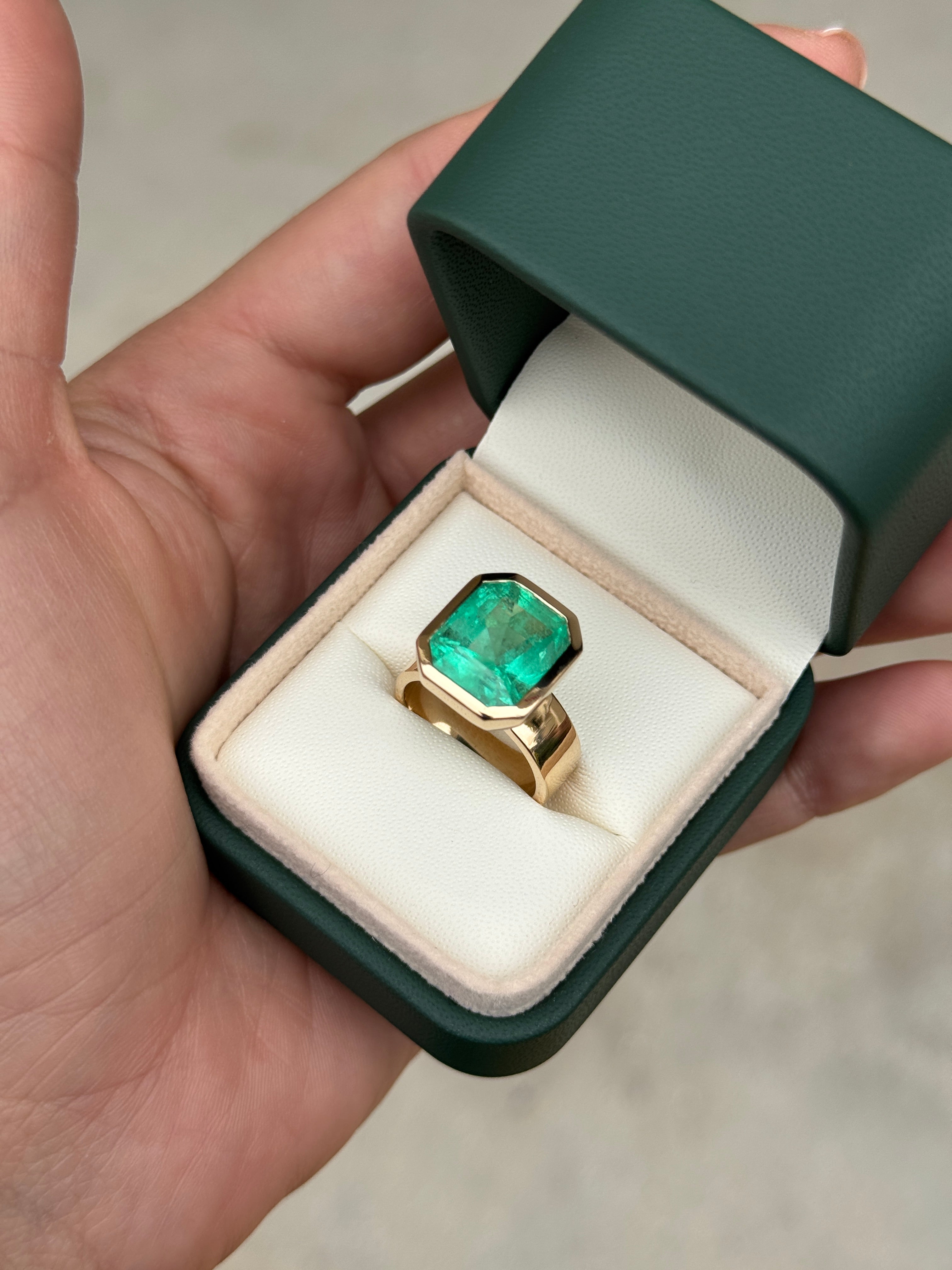 8.15 Carat Ultra Bright Colombian Emerald Solitaire Ring Emerald Cut Bezel Set 18K Gold 6.3mm Wide