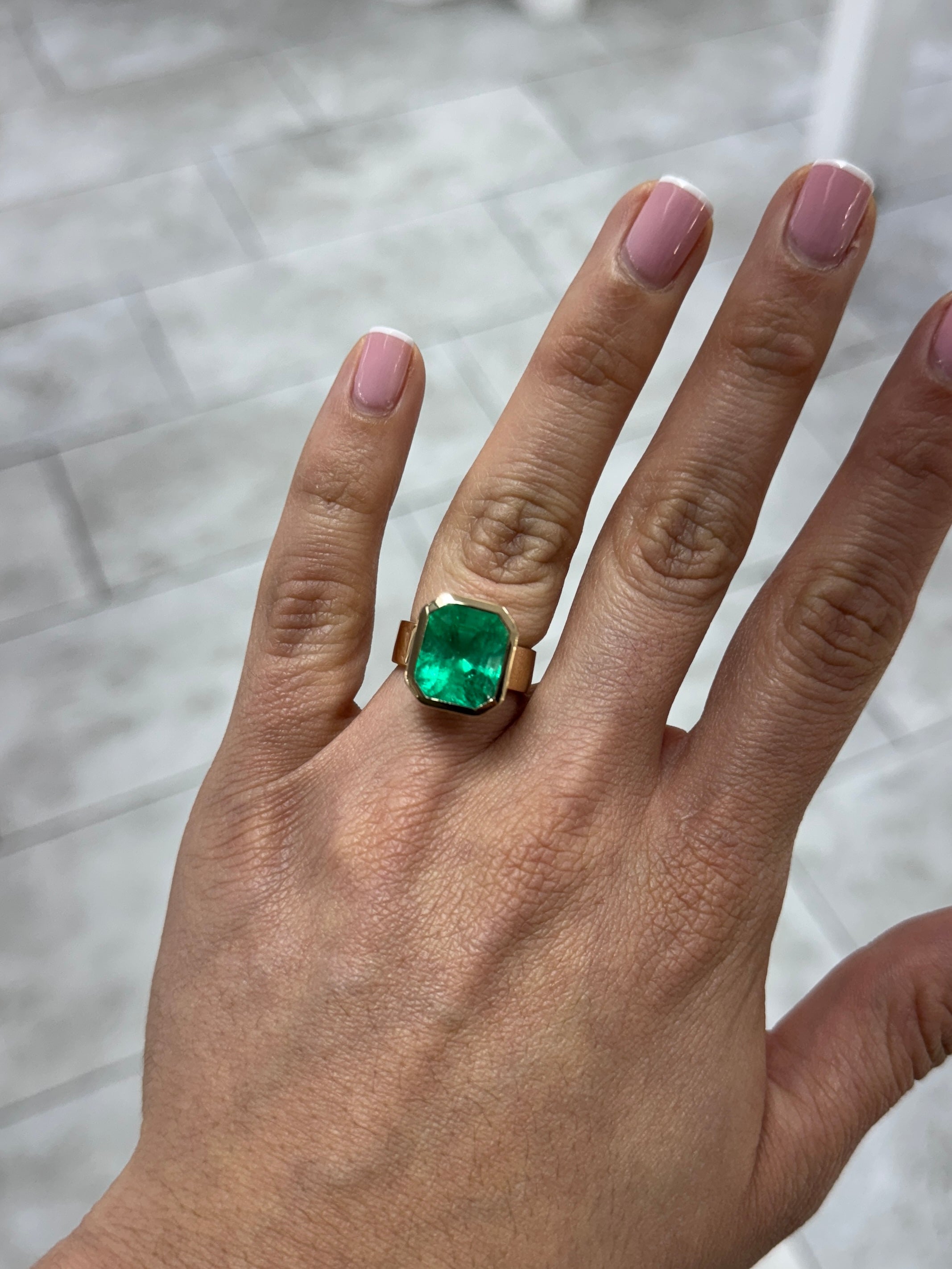 8.15 Carat Ultra Bright Colombian Emerald Solitaire Ring Emerald Cut Bezel Set 18K Gold 6.3mm Wide