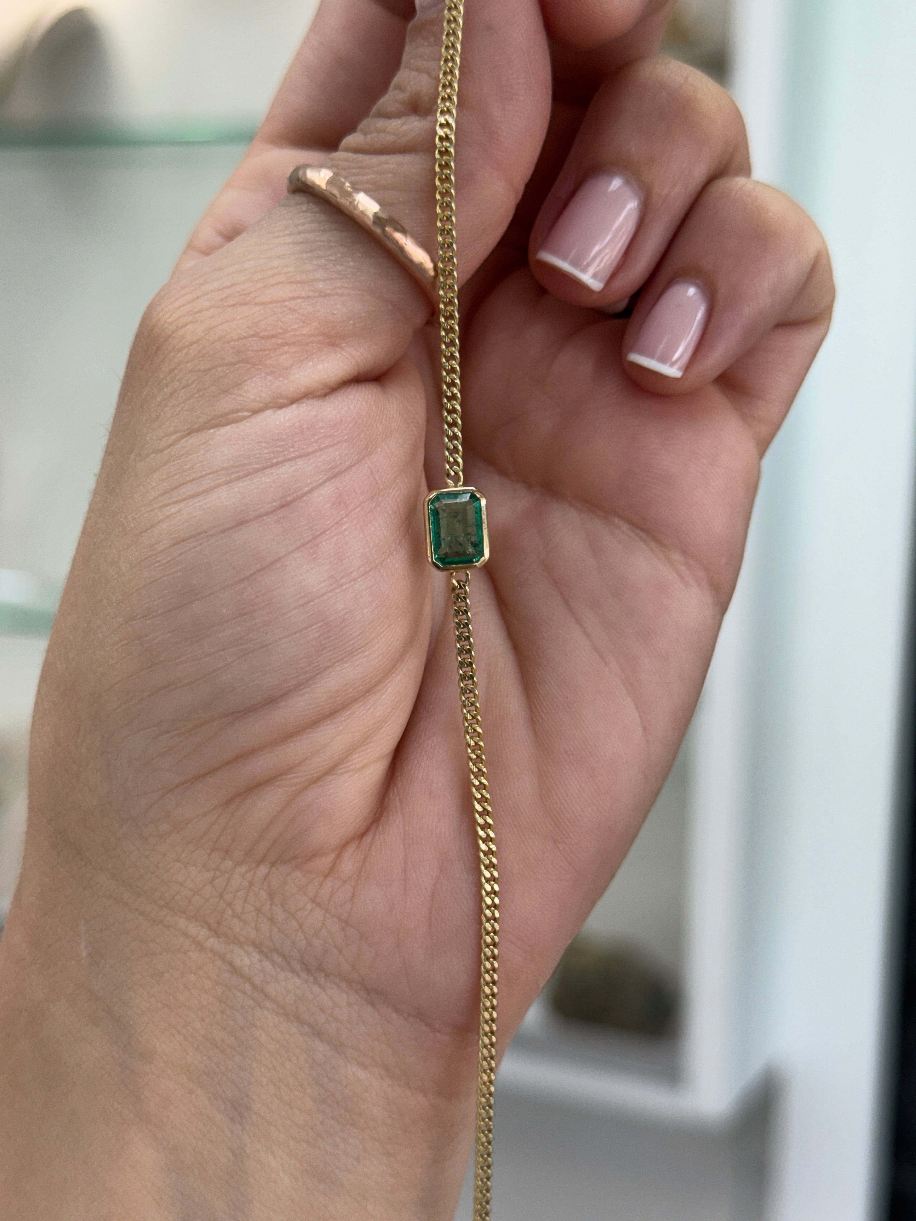 1.19ct 14K Bezel Set Emerald Cut Emerald Curb Chain Bracelet