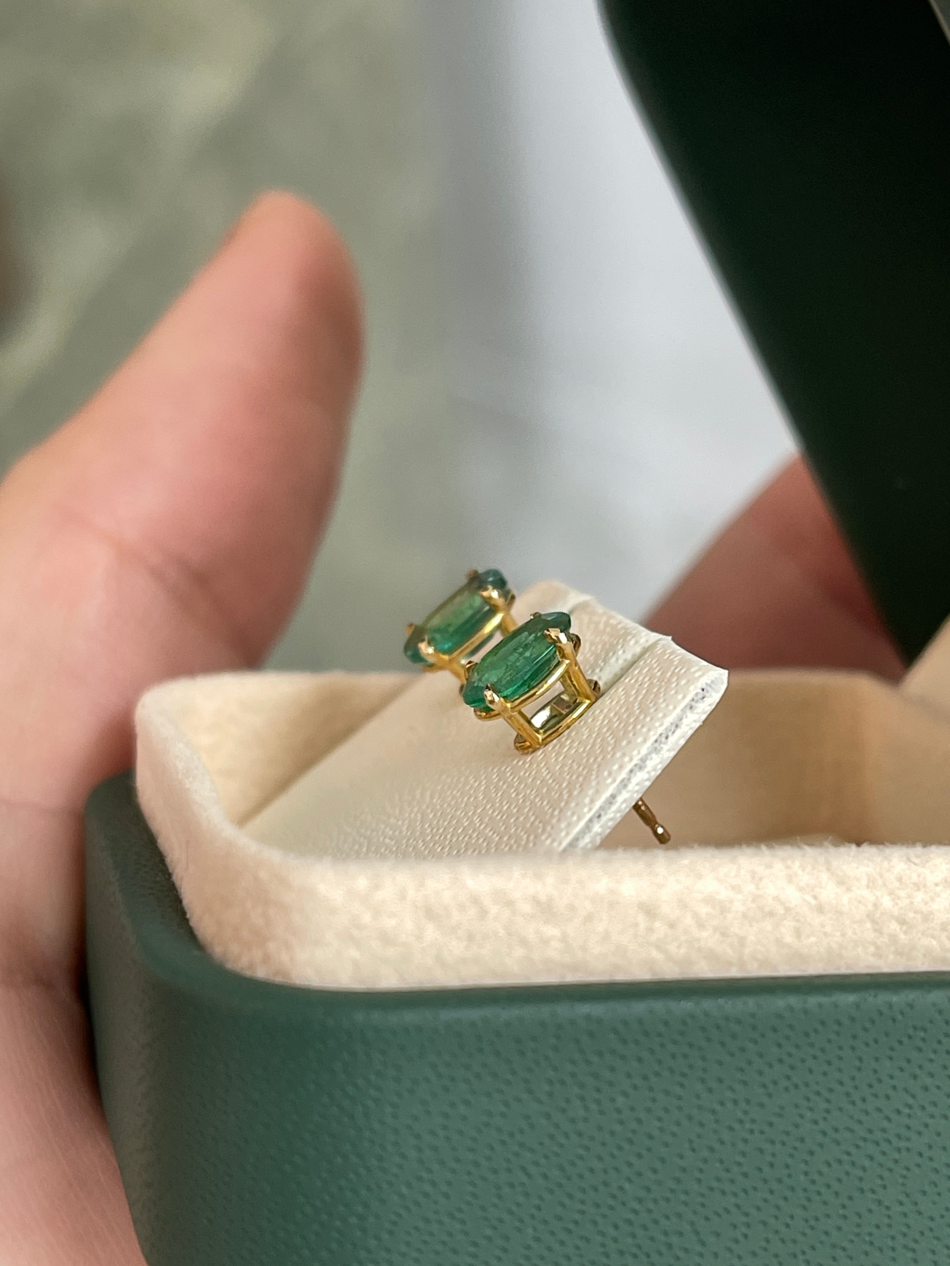 1.60tcw 14K Rich Green Oval Cut Four Prong Emerald Studs Earrings