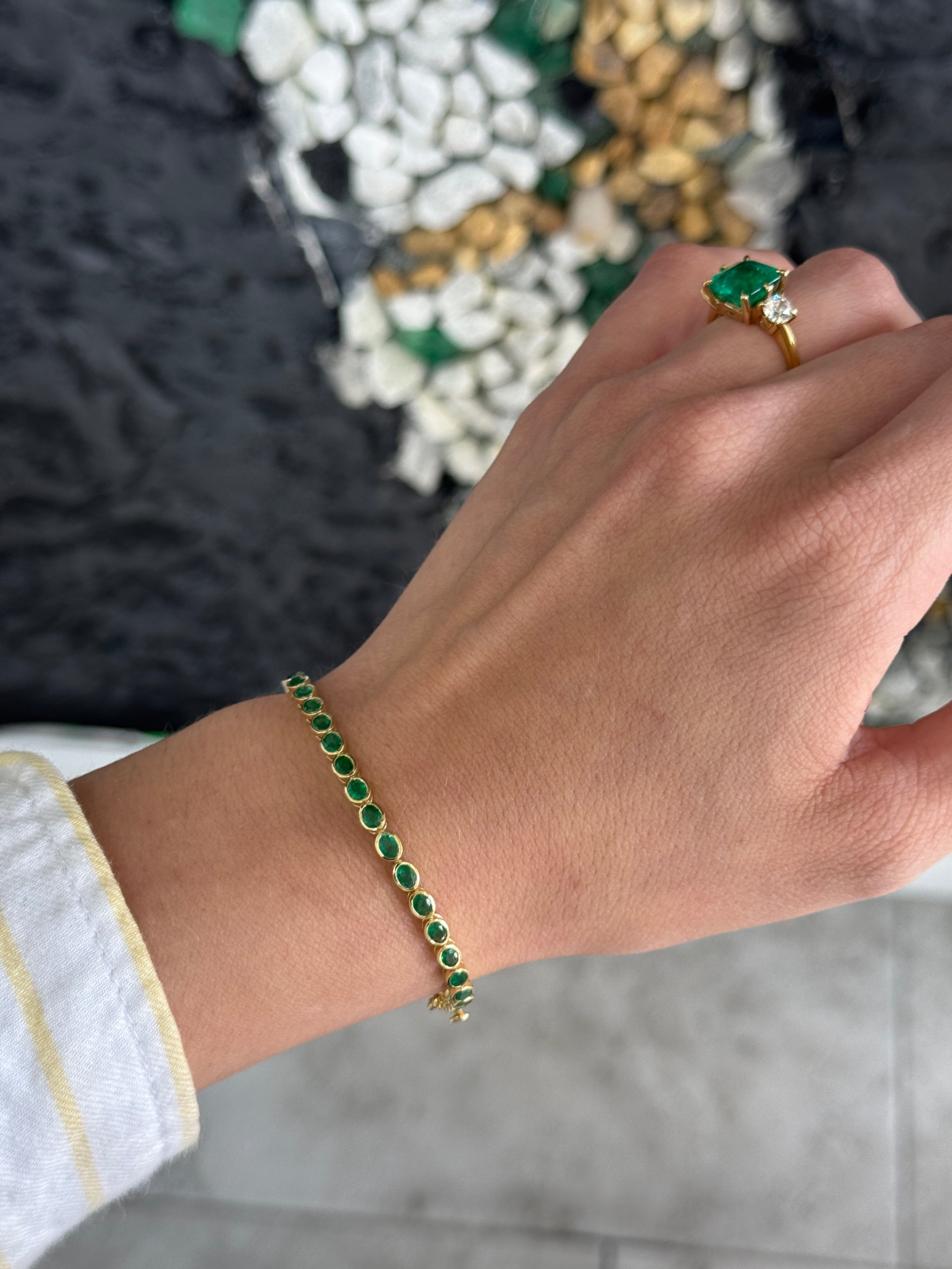 5.74tcw 14K East to West Natural Oval Cut Emerald Bezel Set Tennis Bracelet